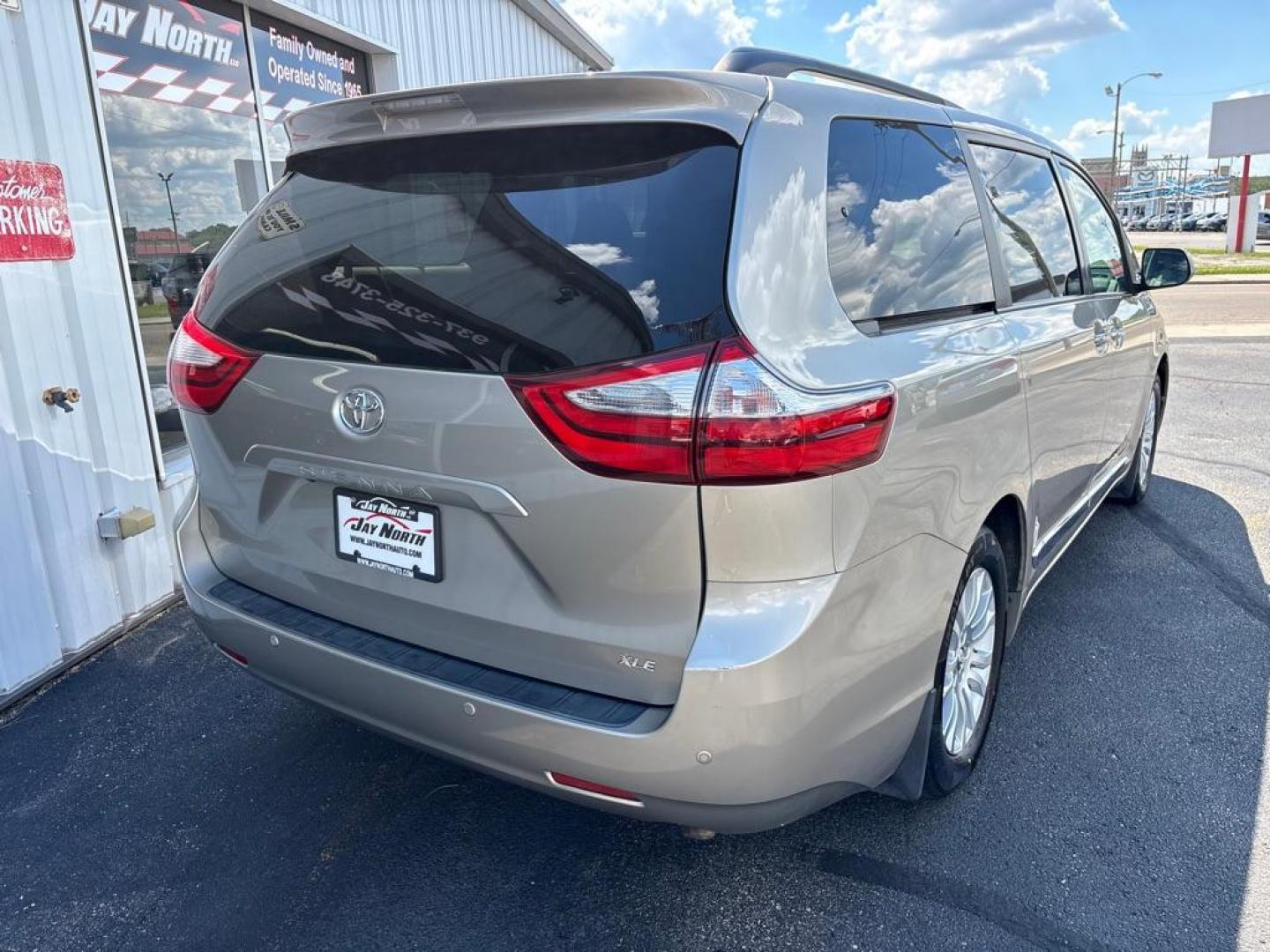 2017 TAN TOYOTA SIENNA XLE (5TDYZ3DC3HS) with an 3.5L engine, Automatic transmission, located at 501 E. Columbia St., Springfield, OH, 45503, (800) 262-7122, 39.925262, -83.801796 - *** Local Trade *** Low Mileage *** LOADED *** New Tires *** XLE *** New Brakes *** Navigation *** Moonroof *** V6 *** 2 Owner w/ Clean CarFax and 22 Service Records *** Power lift Gate *** Power Sliding Doors *** Jay North Auto has offered hand picked vehicles since 1965! Our customer's enjoy a - Photo#2
