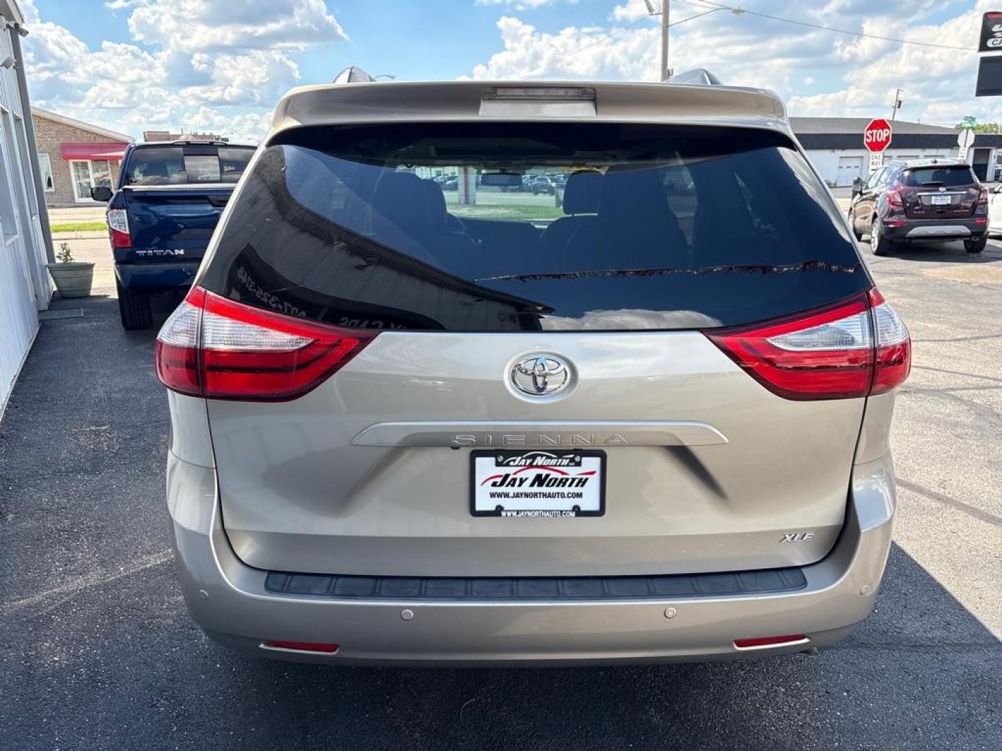 2017 TAN TOYOTA SIENNA XLE (5TDYZ3DC3HS) with an 3.5L engine, Automatic transmission, located at 501 E. Columbia St., Springfield, OH, 45503, (800) 262-7122, 39.925262, -83.801796 - *** Local Trade *** Low Mileage *** LOADED *** New Tires *** XLE *** New Brakes *** Navigation *** Moonroof *** V6 *** 2 Owner w/ Clean CarFax and 22 Service Records *** Power lift Gate *** Power Sliding Doors *** Jay North Auto has offered hand picked vehicles since 1965! Our customer's enjoy a - Photo#3
