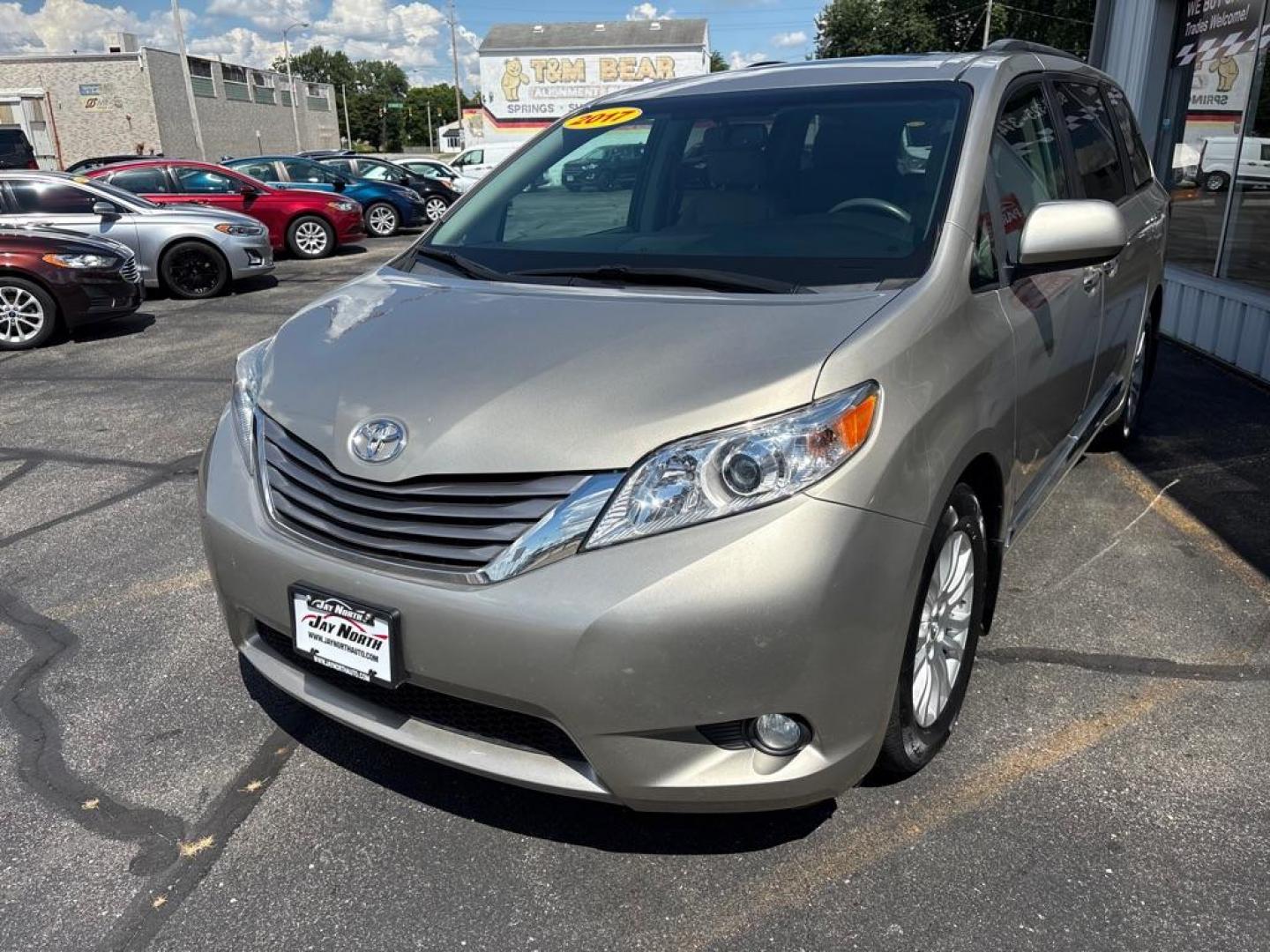 2017 TAN TOYOTA SIENNA XLE (5TDYZ3DC3HS) with an 3.5L engine, Automatic transmission, located at 501 E. Columbia St., Springfield, OH, 45503, (800) 262-7122, 39.925262, -83.801796 - *** Local Trade *** Low Mileage *** LOADED *** New Tires *** XLE *** New Brakes *** Navigation *** Moonroof *** V6 *** 2 Owner w/ Clean CarFax and 22 Service Records *** Power lift Gate *** Power Sliding Doors *** Jay North Auto has offered hand picked vehicles since 1965! Our customer's enjoy a - Photo#5