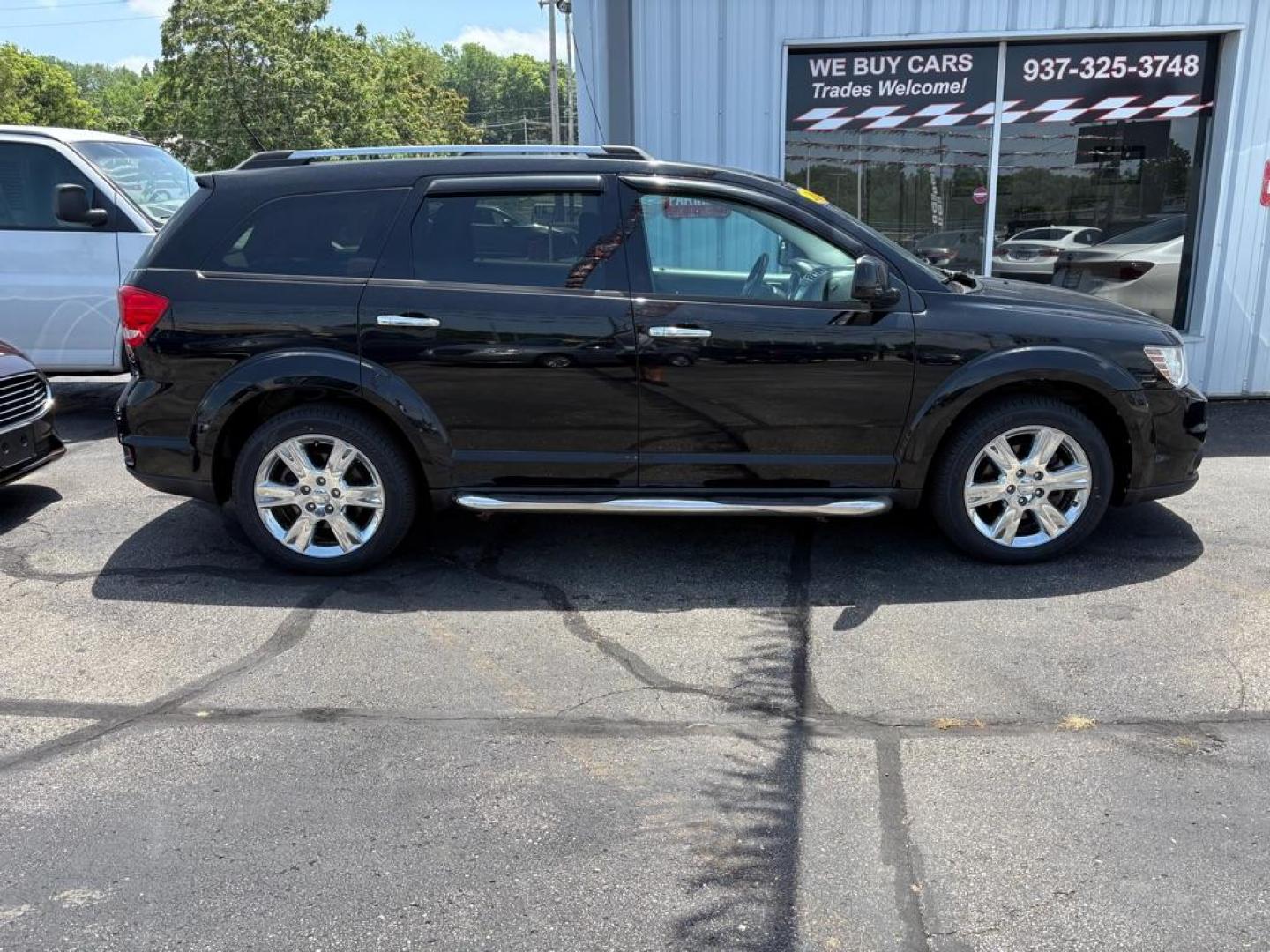 2014 BLACK DODGE JOURNEY LIMITED (3C4PDCDGXET) with an 3.6L engine, Automatic transmission, located at 501 E. Columbia St., Springfield, OH, 45503, (800) 262-7122, 39.925262, -83.801796- Photo#1