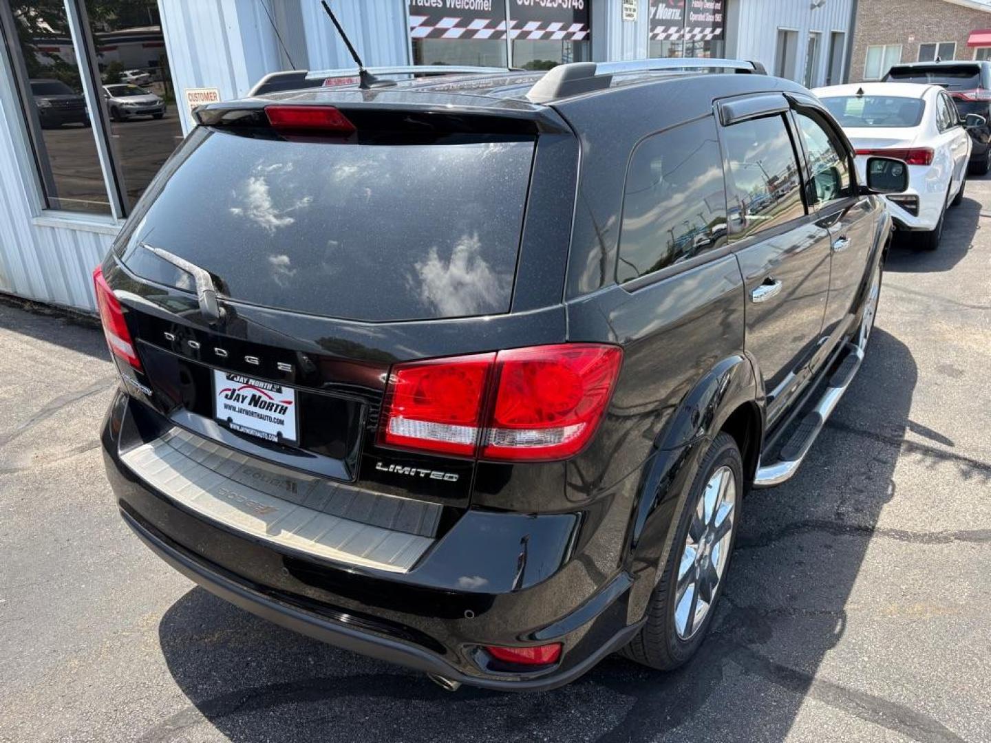 2014 BLACK DODGE JOURNEY LIMITED (3C4PDCDGXET) with an 3.6L engine, Automatic transmission, located at 501 E. Columbia St., Springfield, OH, 45503, (800) 262-7122, 39.925262, -83.801796- Photo#2
