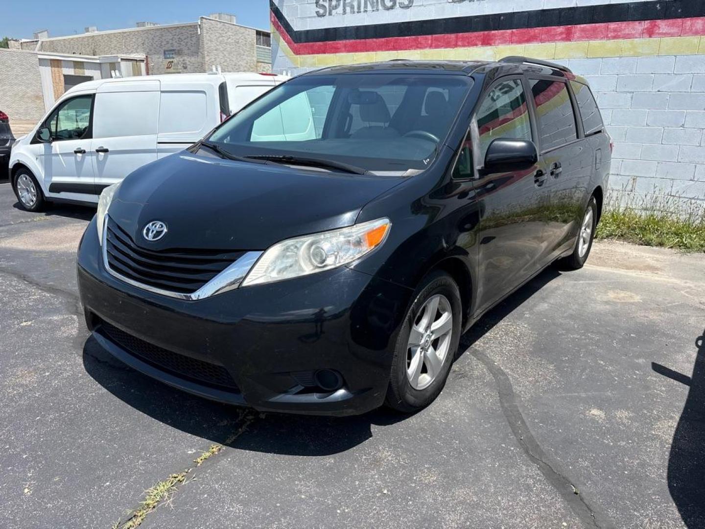 2017 BLACK TOYOTA SIENNA LE (5TDKZ3DC4HS) with an 3.5L engine, Automatic transmission, located at 501 E. Columbia St., Springfield, OH, 45503, (800) 262-7122, 39.925262, -83.801796- Photo#0