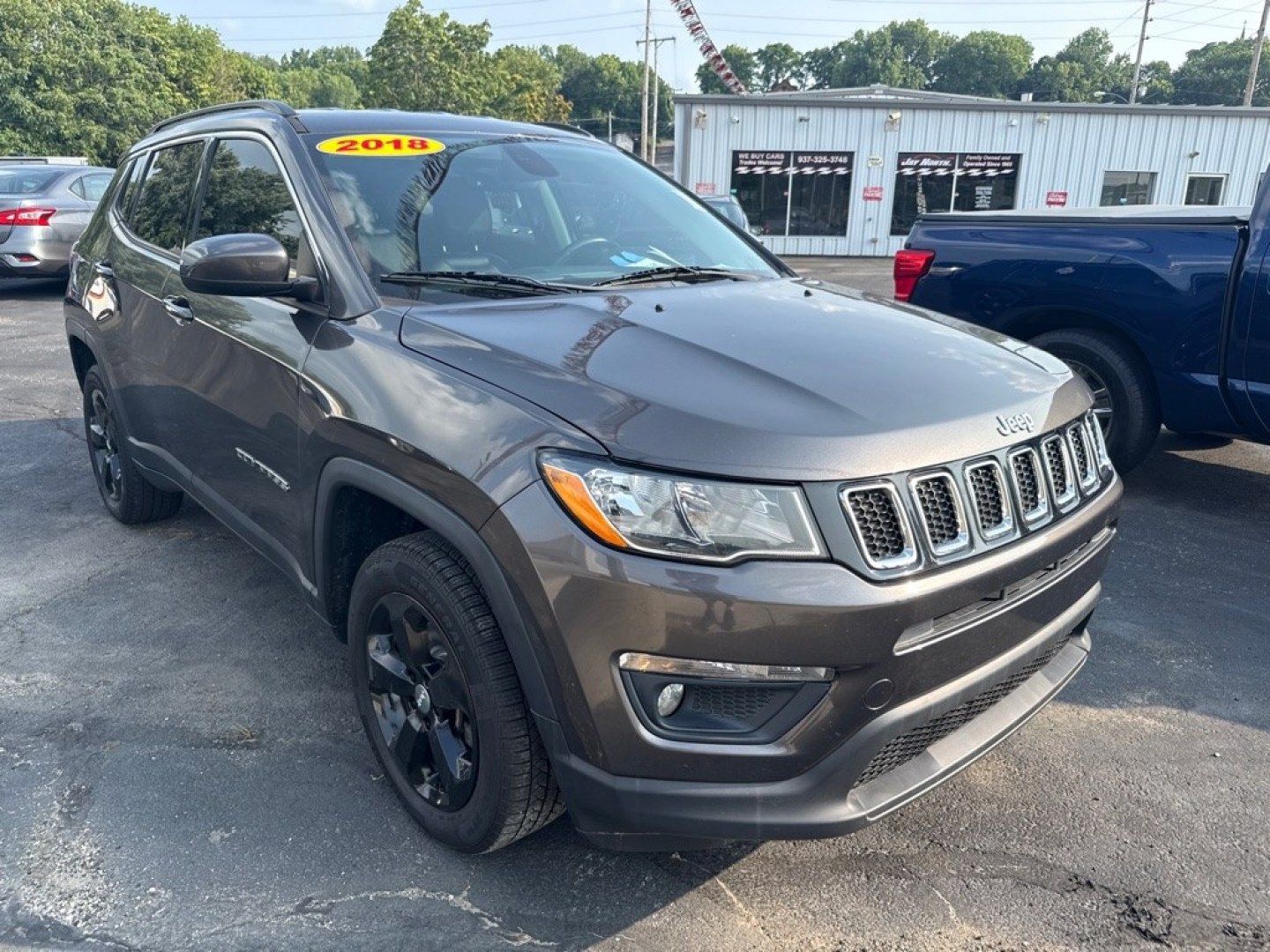 2018 GRAY JEEP COMPASS LATITUDE (3C4NJDBB1JT) with an 2.4L engine, Automatic transmission, located at 501 E. Columbia St., Springfield, OH, 45503, (800) 262-7122, 39.925262, -83.801796 - *** 1 Owner w/ Clean CarFax 22 Service Records *** Tune Up *** New Brakes *** New Wipers *** Oil Change *** Inspection *** 4x4 *** Cold Weather Group Heated Front Seats Heated Steering Whe- Photo#0