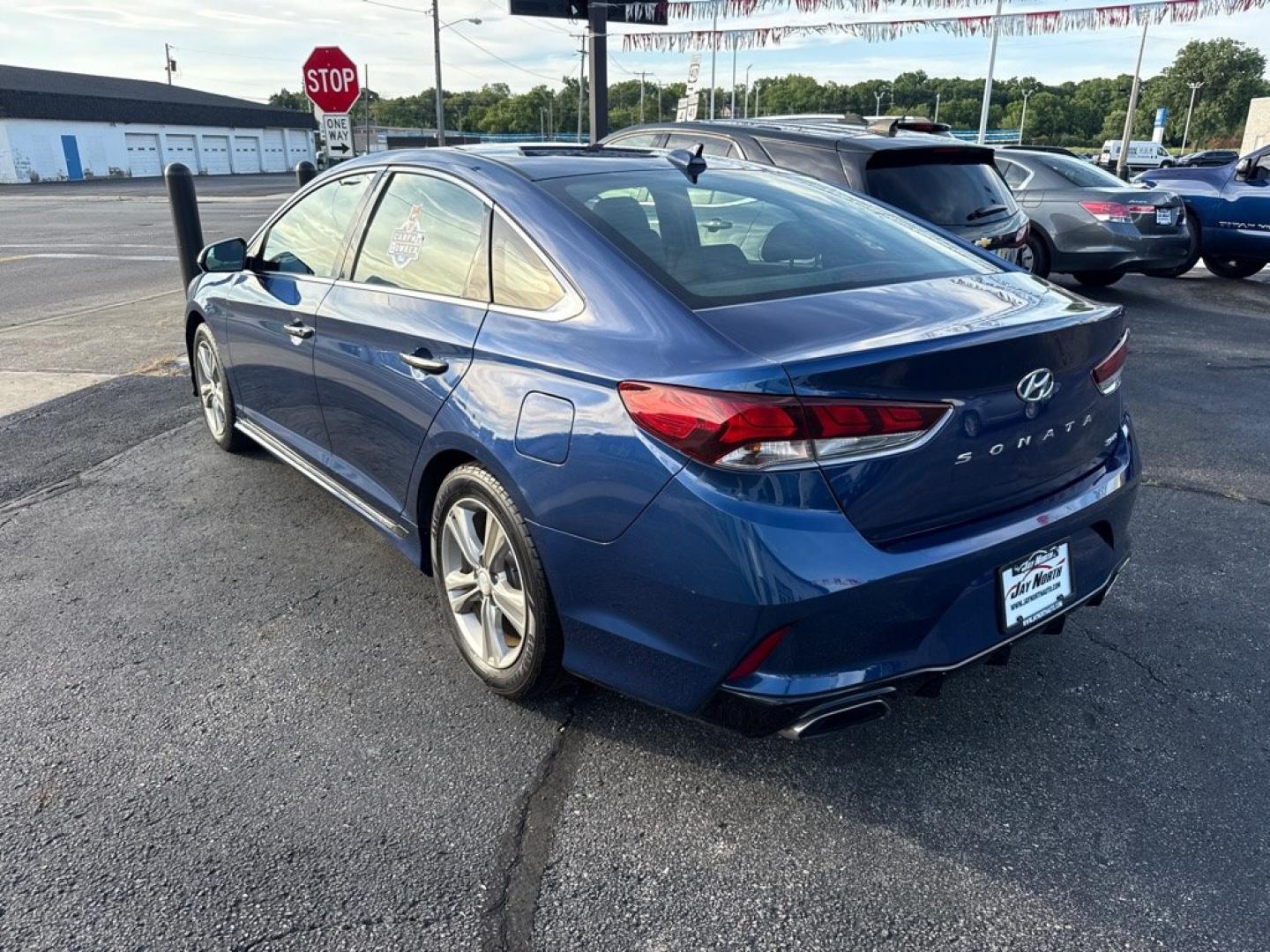 2018 BLUE HYUNDAI SONATA SPORT (5NPE34AF1JH) with an 2.4L engine, Automatic transmission, located at 501 E. Columbia St., Springfield, OH, 45503, (800) 262-7122, 39.925262, -83.801796 - *** 1 Owner w/ 21 Service Records *** Apply CarPlay *** Blind Spot Monitoring *** New Battery *** New Brakes *** New Tie Rod ends *** New Air and Cabin Filter *** Oil Change *** STANDARD FEATURES: ADVANCED SAFETY TECHNOLOGY Blind Spot Detection System w/ Rear Cross-Traffic Alert INCLUDED Vehi- Photo#4