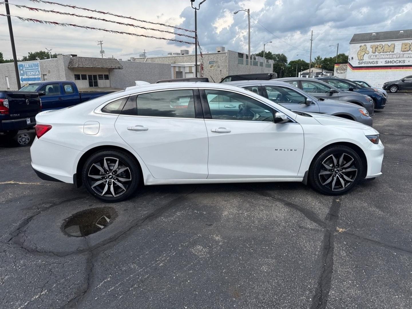 2017 WHITE CHEVROLET MALIBU LT (1G1ZE5ST3HF) with an 1.5L engine, Automatic transmission, located at 501 E. Columbia St., Springfield, OH, 45503, (800) 262-7122, 39.925262, -83.801796 - *** New Tires *** New Brakes *** LT *** 30 Service Records on CarFax *** Tune Up *** Back Up Camera *** Alloy Wheels *** Jay North Auto has offered hand picked vehicles since 1965! Our customer's enjoy a NO pressure buying experience with a small town feel. We are a preferred dealer for many l- Photo#6