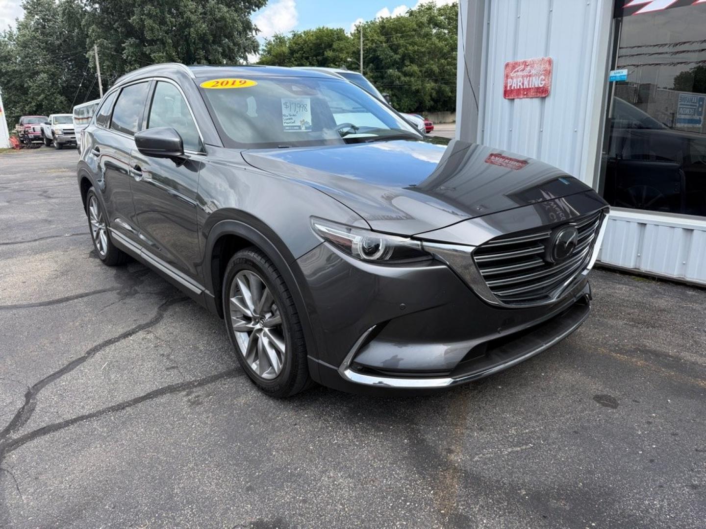 2019 GRAY MAZDA CX-9 SIGNATURE (JM3TCBEY7K0) with an 2.5L engine, Automatic transmission, located at 501 E. Columbia St., Springfield, OH, 45503, (800) 262-7122, 39.925262, -83.801796 - *** Signature *** 36 Service Records on CarFax *** All Wheel Drive *** Moonroof *** Leather *** Heated and Cooled Seating *** Back Up Camera *** Premium Audio *** Tune Up *** New Brakes *** New Wipers *** Oil Change *** Inspection *** New Cabin and Air filter *** Jay North Auto has offered hand- Photo#0