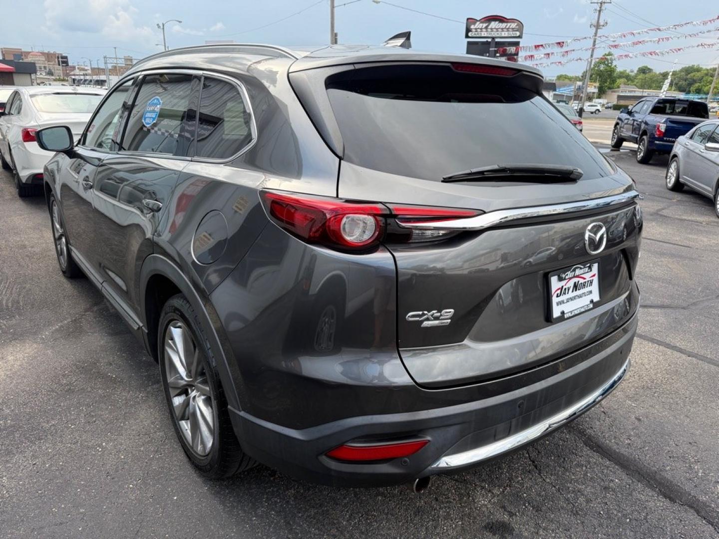 2019 GRAY MAZDA CX-9 SIGNATURE (JM3TCBEY7K0) with an 2.5L engine, Automatic transmission, located at 501 E. Columbia St., Springfield, OH, 45503, (800) 262-7122, 39.925262, -83.801796 - *** Signature *** 36 Service Records on CarFax *** All Wheel Drive *** Moonroof *** Leather *** Heated and Cooled Seating *** Back Up Camera *** Premium Audio *** Tune Up *** New Brakes *** New Wipers *** Oil Change *** Inspection *** New Cabin and Air filter *** Jay North Auto has offered hand- Photo#3