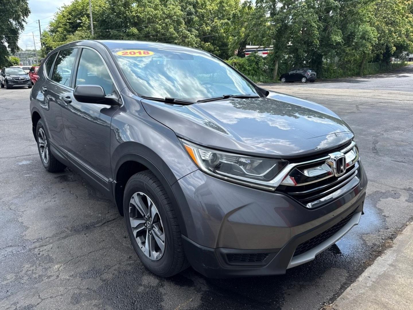 2018 GRAY HONDA CR-V LX (2HKRW6H35JH) with an 2.4L engine, Continuously Variable transmission, located at 501 E. Columbia St., Springfield, OH, 45503, (800) 262-7122, 39.925262, -83.801796- Photo#0
