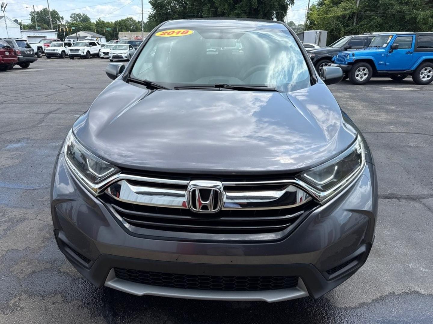 2018 GRAY HONDA CR-V LX (2HKRW6H35JH) with an 2.4L engine, Continuously Variable transmission, located at 501 E. Columbia St., Springfield, OH, 45503, (800) 262-7122, 39.925262, -83.801796- Photo#1