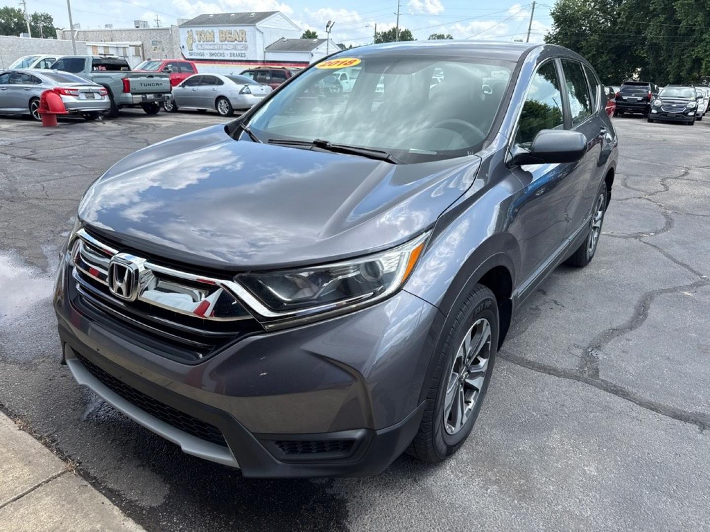 2018 GRAY HONDA CR-V LX (2HKRW6H35JH) with an 2.4L engine, Continuously Variable transmission, located at 501 E. Columbia St., Springfield, OH, 45503, (800) 262-7122, 39.925262, -83.801796- Photo#2