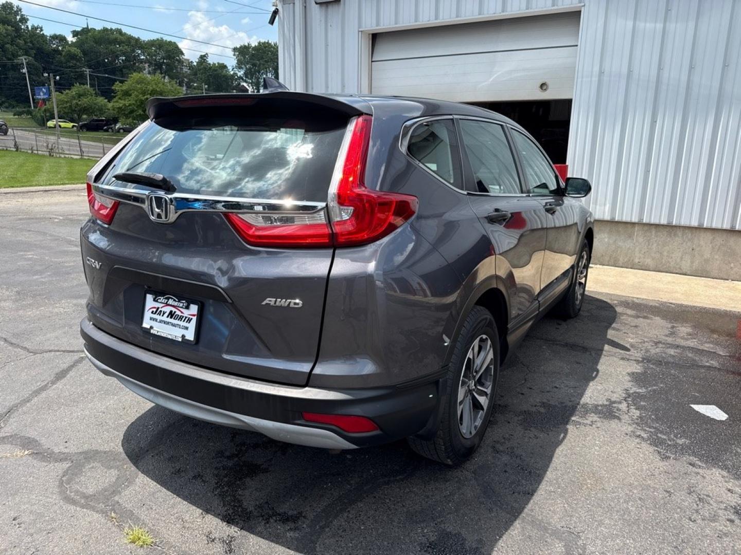 2018 GRAY HONDA CR-V LX (2HKRW6H35JH) with an 2.4L engine, Continuously Variable transmission, located at 501 E. Columbia St., Springfield, OH, 45503, (800) 262-7122, 39.925262, -83.801796- Photo#6