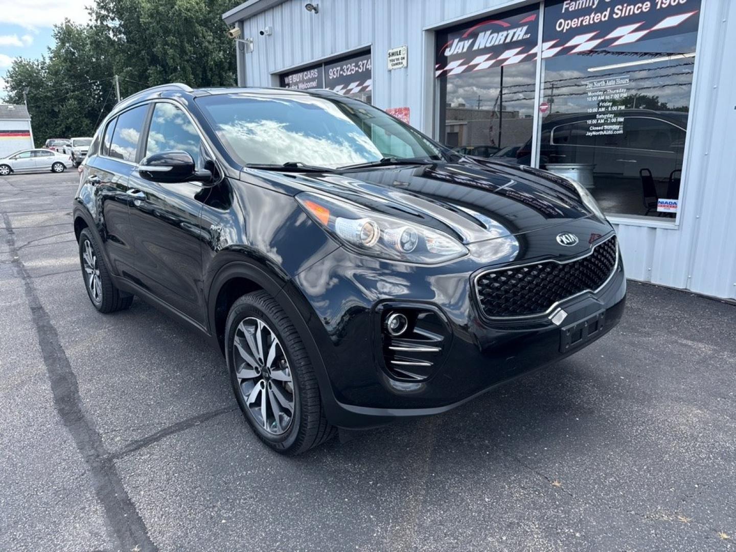 2017 BLACK KIA SPORTAGE EX PREMIUM (KNDPNCAC3H7) with an 2.4L engine, Automatic transmission, located at 501 E. Columbia St., Springfield, OH, 45503, (800) 262-7122, 39.925262, -83.801796 - *** 1-Owner w/ Clean CarFax *** Tune Up *** New Brakes *** New wheel hub and axle *** New Cabin and Air filter *** Oil Change *** EX Premium Package Panoramic Sunroof- Pwr Folding Mirrors w/ LED Turn Signals- Blind Spot Detection (BSD)- Lane Change Assist (LCA)- Rear Cross Traffic Alert (RCTA)- Hea- Photo#0