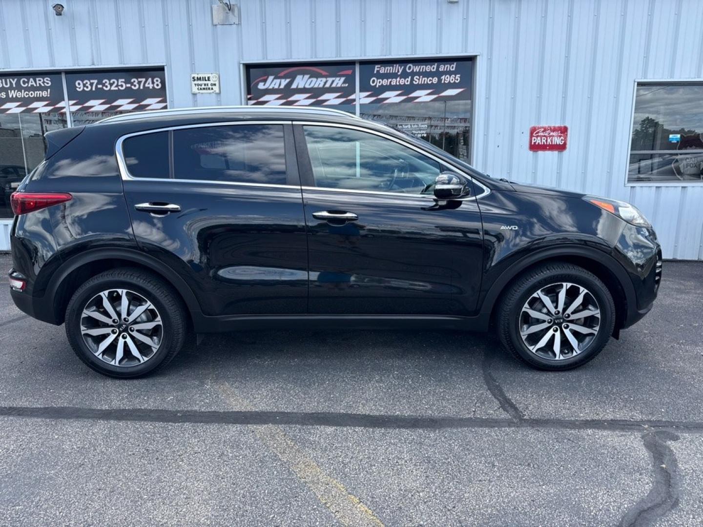 2017 BLACK KIA SPORTAGE EX PREMIUM (KNDPNCAC3H7) with an 2.4L engine, Automatic transmission, located at 501 E. Columbia St., Springfield, OH, 45503, (800) 262-7122, 39.925262, -83.801796 - *** 1-Owner w/ Clean CarFax *** Tune Up *** New Brakes *** New wheel hub and axle *** New Cabin and Air filter *** Oil Change *** EX Premium Package Panoramic Sunroof- Pwr Folding Mirrors w/ LED Turn Signals- Blind Spot Detection (BSD)- Lane Change Assist (LCA)- Rear Cross Traffic Alert (RCTA)- Hea- Photo#1