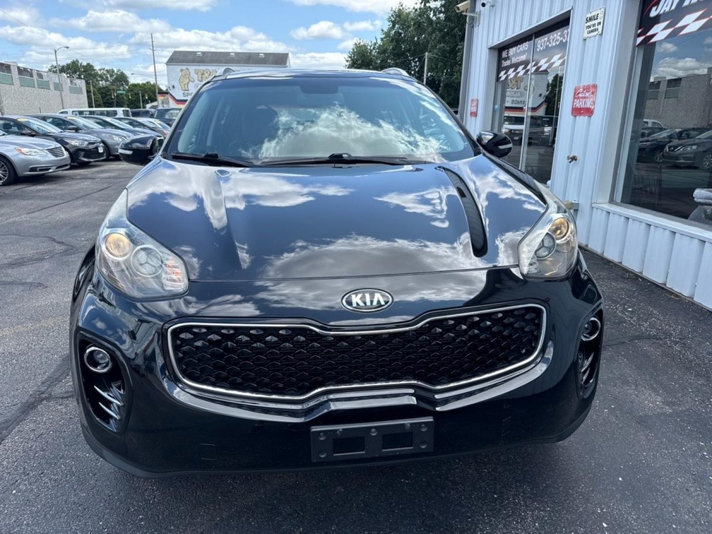 2017 BLACK KIA SPORTAGE EX PREMIUM (KNDPNCAC3H7) with an 2.4L engine, Automatic transmission, located at 501 E. Columbia St., Springfield, OH, 45503, (800) 262-7122, 39.925262, -83.801796 - *** 1-Owner w/ Clean CarFax *** Tune Up *** New Brakes *** New wheel hub and axle *** New Cabin and Air filter *** Oil Change *** EX Premium Package Panoramic Sunroof- Pwr Folding Mirrors w/ LED Turn Signals- Blind Spot Detection (BSD)- Lane Change Assist (LCA)- Rear Cross Traffic Alert (RCTA)- Hea- Photo#2