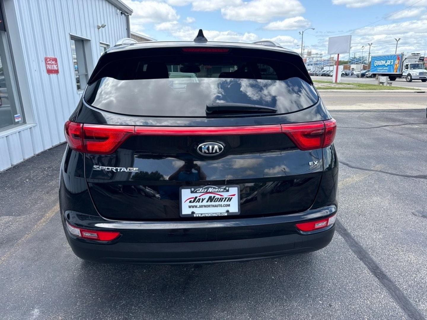 2017 BLACK KIA SPORTAGE EX PREMIUM (KNDPNCAC3H7) with an 2.4L engine, Automatic transmission, located at 501 E. Columbia St., Springfield, OH, 45503, (800) 262-7122, 39.925262, -83.801796 - *** 1-Owner w/ Clean CarFax *** Tune Up *** New Brakes *** New wheel hub and axle *** New Cabin and Air filter *** Oil Change *** EX Premium Package Panoramic Sunroof- Pwr Folding Mirrors w/ LED Turn Signals- Blind Spot Detection (BSD)- Lane Change Assist (LCA)- Rear Cross Traffic Alert (RCTA)- Hea- Photo#5