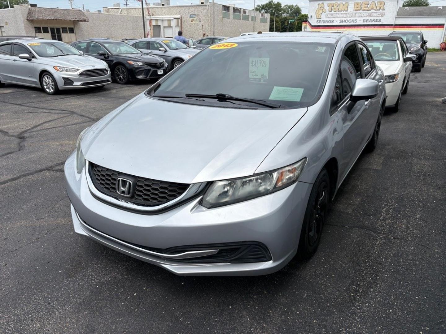2013 SILVER HONDA CIVIC LX (19XFB2F59DE) with an 1.8L engine, Automatic transmission, located at 501 E. Columbia St., Springfield, OH, 45503, (800) 262-7122, 39.925262, -83.801796 - *** Clean CarFax *** New Brakes *** New Wipers *** Inspection *** LX *** Automatic *** 1.8L *** Jay North Auto has offered hand picked vehicles since 1965! Our customer's enjoy a NO pressure buying experience with a small town feel. We are a preferred dealer for many local credit unions and le- Photo#5