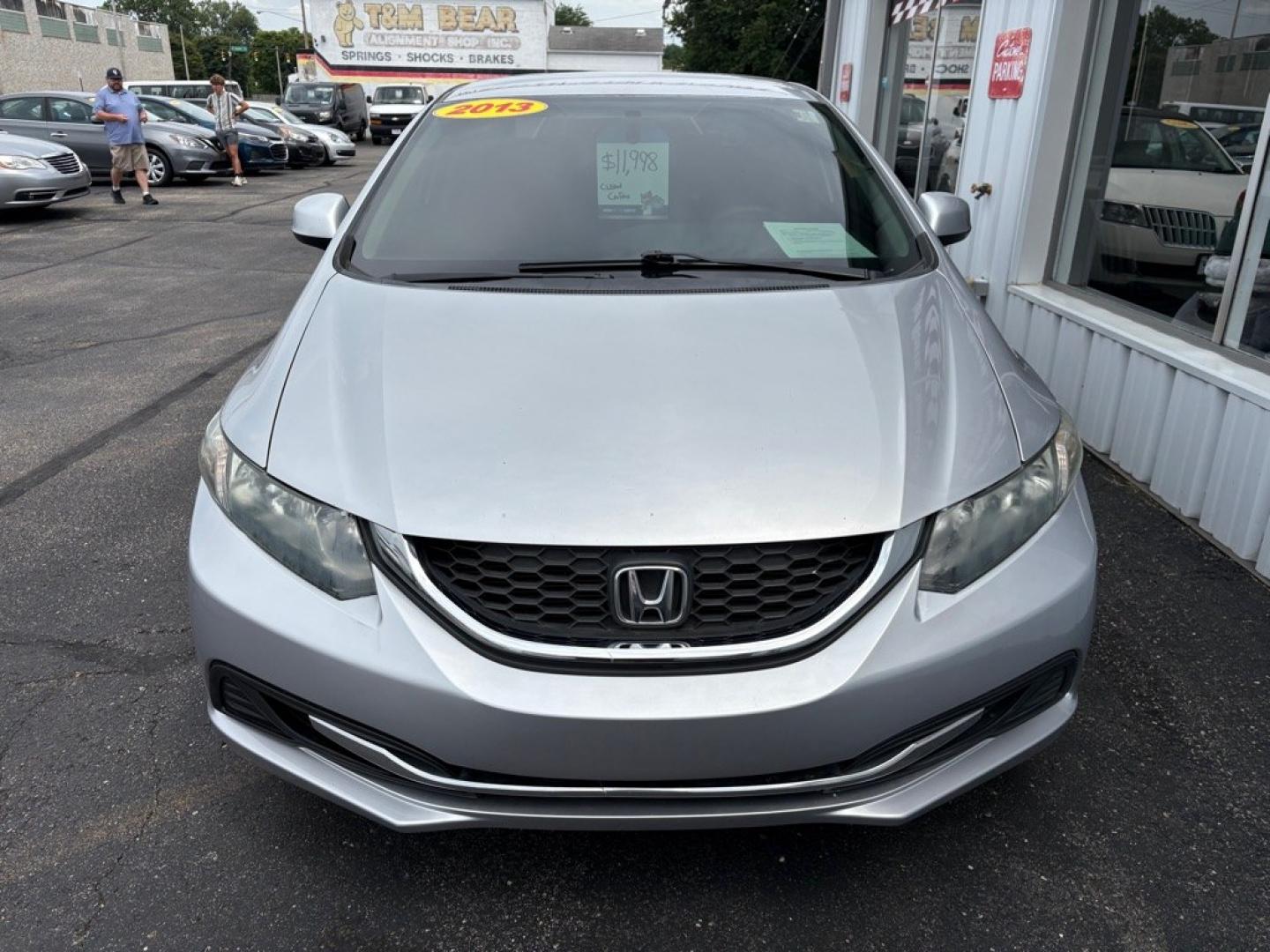 2013 SILVER HONDA CIVIC LX (19XFB2F59DE) with an 1.8L engine, Automatic transmission, located at 501 E. Columbia St., Springfield, OH, 45503, (800) 262-7122, 39.925262, -83.801796 - *** Clean CarFax *** New Brakes *** New Wipers *** Inspection *** LX *** Automatic *** 1.8L *** Jay North Auto has offered hand picked vehicles since 1965! Our customer's enjoy a NO pressure buying experience with a small town feel. We are a preferred dealer for many local credit unions and le- Photo#6