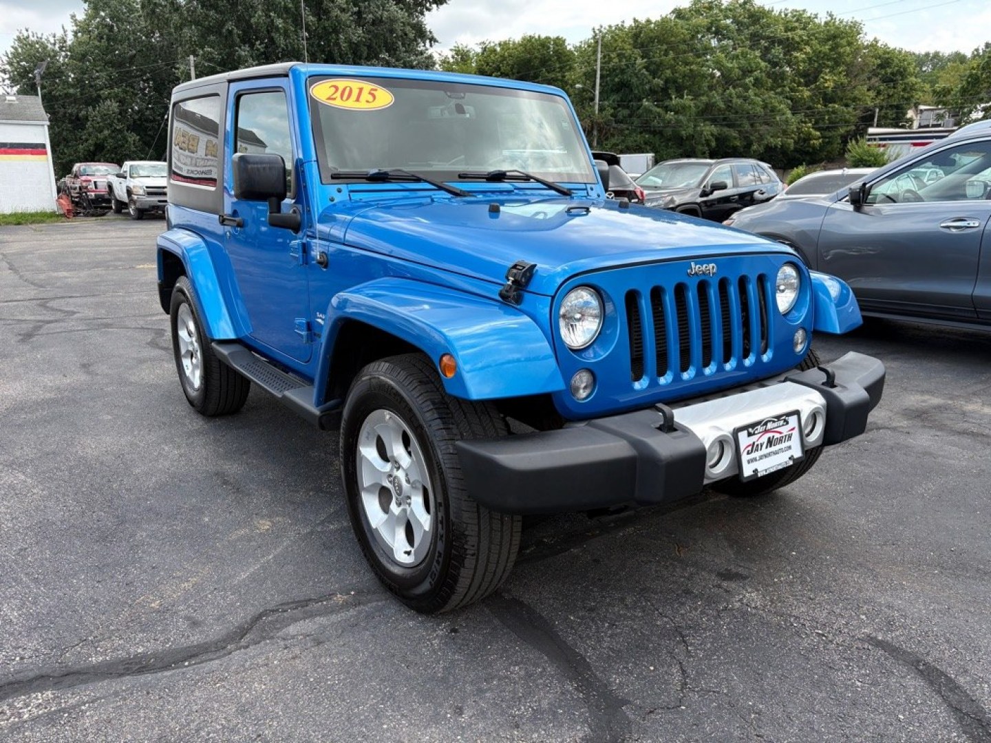 2015 BLUE JEEP WRANGLER SAHARA (1C4AJWBG1FL) with an 3.6L engine, Automatic transmission, located at 501 E. Columbia St., Springfield, OH, 45503, (800) 262-7122, 39.925262, -83.801796 - *** 1 Owner w/ Clean CarFax *** V6 Automatic 4x4 *** New Battery *** New Axle Seals *** New Brakes *** New Upgraded Oil Filter Housing *** New Air Filter *** Oil Change *** Inspection *** Premium Audio *** Hard Top *** Jay North Auto has offered hand picked vehicles since 1965! Our customer's en- Photo#0