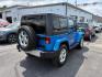 2015 BLUE JEEP WRANGLER SAHARA (1C4AJWBG1FL) with an 3.6L engine, Automatic transmission, located at 501 E. Columbia St., Springfield, OH, 45503, (800) 262-7122, 39.925262, -83.801796 - *** 1 Owner w/ Clean CarFax *** V6 Automatic 4x4 *** New Battery *** New Axle Seals *** New Brakes *** New Upgraded Oil Filter Housing *** New Air Filter *** Oil Change *** Inspection *** Premium Audio *** Hard Top *** Jay North Auto has offered hand picked vehicles since 1965! Our customer's en- Photo#2