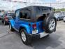2015 BLUE JEEP WRANGLER SAHARA (1C4AJWBG1FL) with an 3.6L engine, Automatic transmission, located at 501 E. Columbia St., Springfield, OH, 45503, (800) 262-7122, 39.925262, -83.801796 - *** 1 Owner w/ Clean CarFax *** V6 Automatic 4x4 *** New Battery *** New Axle Seals *** New Brakes *** New Upgraded Oil Filter Housing *** New Air Filter *** Oil Change *** Inspection *** Premium Audio *** Hard Top *** Jay North Auto has offered hand picked vehicles since 1965! Our customer's en- Photo#4