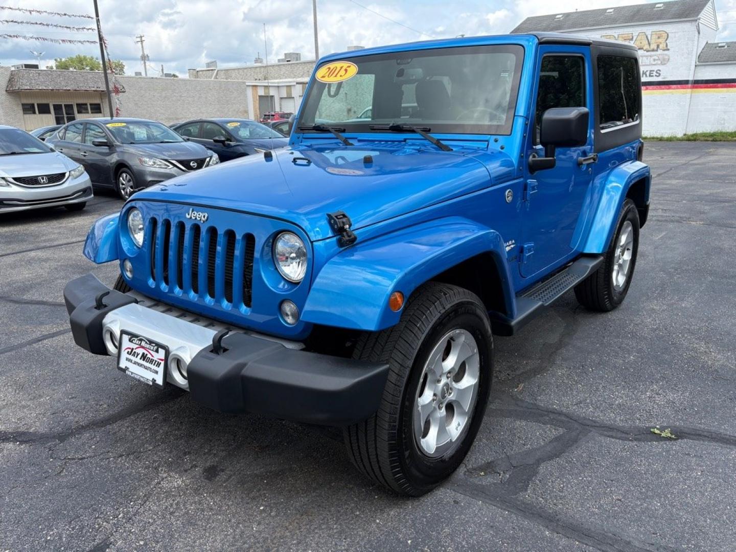 2015 BLUE JEEP WRANGLER SAHARA (1C4AJWBG1FL) with an 3.6L engine, Automatic transmission, located at 501 E. Columbia St., Springfield, OH, 45503, (800) 262-7122, 39.925262, -83.801796 - *** 1 Owner w/ Clean CarFax *** V6 Automatic 4x4 *** New Battery *** New Axle Seals *** New Brakes *** New Upgraded Oil Filter Housing *** New Air Filter *** Oil Change *** Inspection *** Premium Audio *** Hard Top *** Jay North Auto has offered hand picked vehicles since 1965! Our customer's en- Photo#5