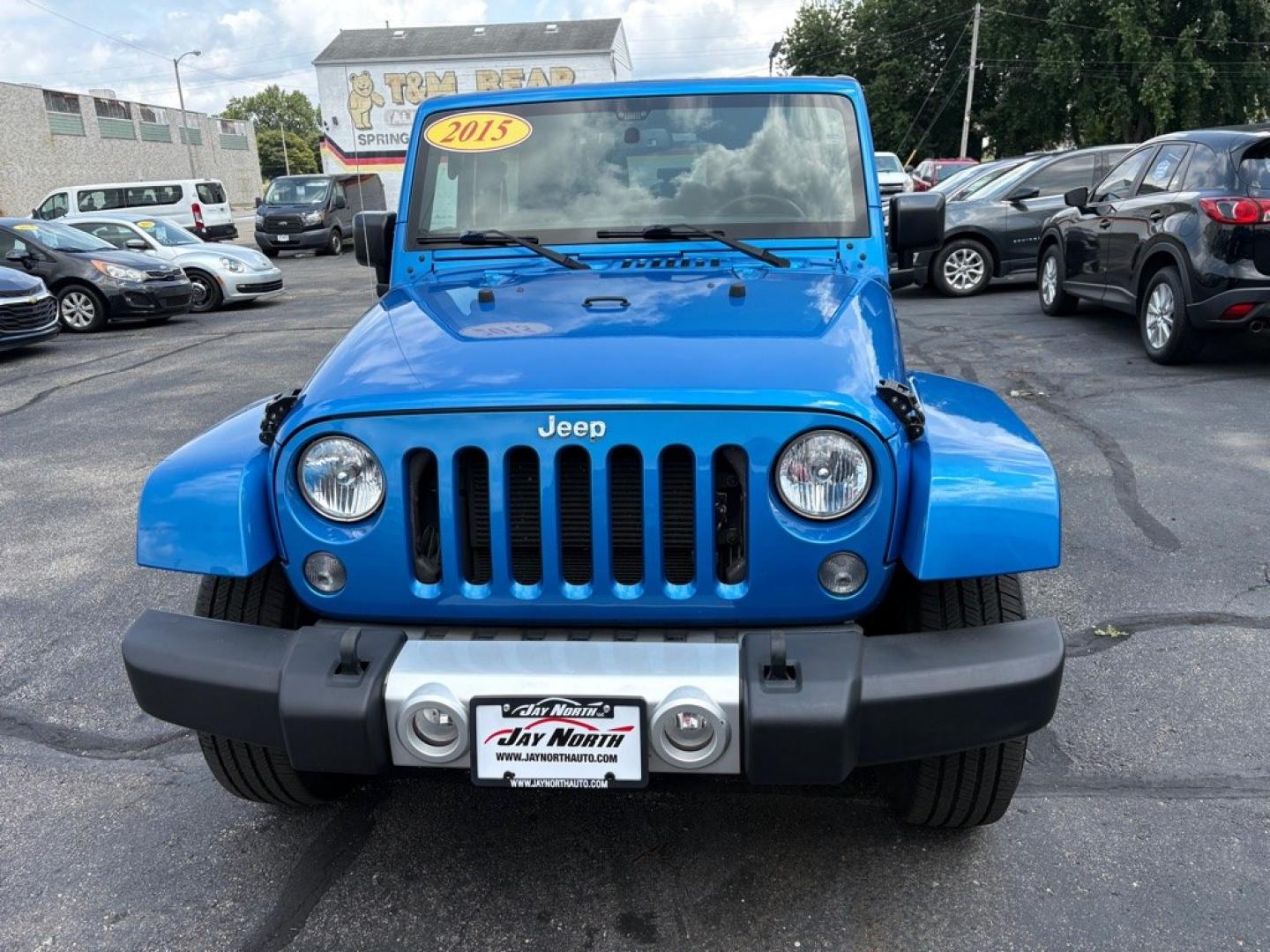 2015 BLUE JEEP WRANGLER SAHARA (1C4AJWBG1FL) with an 3.6L engine, Automatic transmission, located at 501 E. Columbia St., Springfield, OH, 45503, (800) 262-7122, 39.925262, -83.801796 - *** 1 Owner w/ Clean CarFax *** V6 Automatic 4x4 *** New Battery *** New Axle Seals *** New Brakes *** New Upgraded Oil Filter Housing *** New Air Filter *** Oil Change *** Inspection *** Premium Audio *** Hard Top *** Jay North Auto has offered hand picked vehicles since 1965! Our customer's en- Photo#6