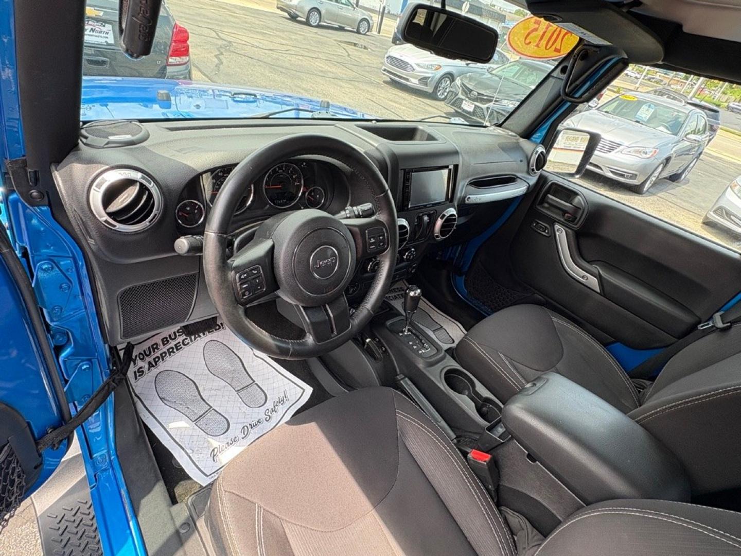 2015 BLUE JEEP WRANGLER SAHARA (1C4AJWBG1FL) with an 3.6L engine, Automatic transmission, located at 501 E. Columbia St., Springfield, OH, 45503, (800) 262-7122, 39.925262, -83.801796 - *** 1 Owner w/ Clean CarFax *** V6 Automatic 4x4 *** New Battery *** New Axle Seals *** New Brakes *** New Upgraded Oil Filter Housing *** New Air Filter *** Oil Change *** Inspection *** Premium Audio *** Hard Top *** Jay North Auto has offered hand picked vehicles since 1965! Our customer's en- Photo#9