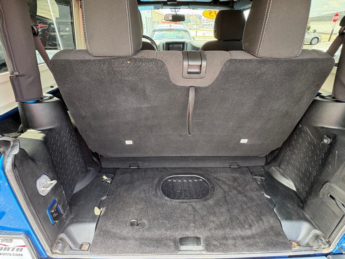 2015 BLUE JEEP WRANGLER SAHARA (1C4AJWBG1FL) with an 3.6L engine, Automatic transmission, located at 501 E. Columbia St., Springfield, OH, 45503, (800) 262-7122, 39.925262, -83.801796 - *** 1 Owner w/ Clean CarFax *** V6 Automatic 4x4 *** New Battery *** New Axle Seals *** New Brakes *** New Upgraded Oil Filter Housing *** New Air Filter *** Oil Change *** Inspection *** Premium Audio *** Hard Top *** Jay North Auto has offered hand picked vehicles since 1965! Our customer's en- Photo#11