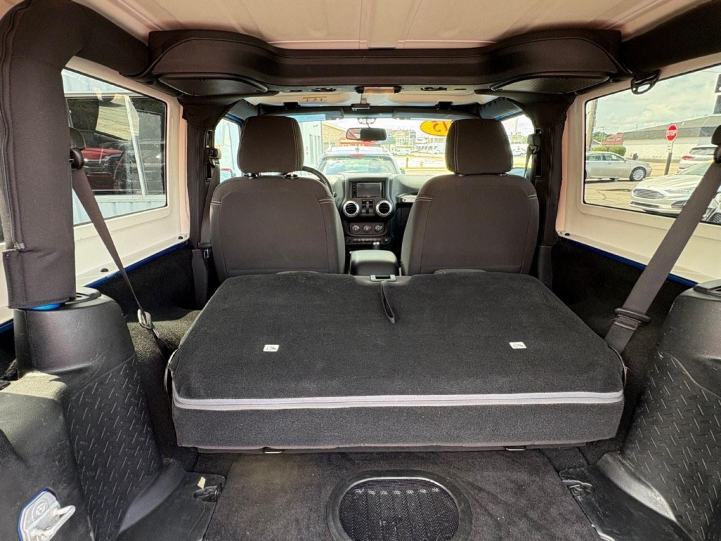 2015 BLUE JEEP WRANGLER SAHARA (1C4AJWBG1FL) with an 3.6L engine, Automatic transmission, located at 501 E. Columbia St., Springfield, OH, 45503, (800) 262-7122, 39.925262, -83.801796 - *** 1 Owner w/ Clean CarFax *** V6 Automatic 4x4 *** New Battery *** New Axle Seals *** New Brakes *** New Upgraded Oil Filter Housing *** New Air Filter *** Oil Change *** Inspection *** Premium Audio *** Hard Top *** Jay North Auto has offered hand picked vehicles since 1965! Our customer's en- Photo#12