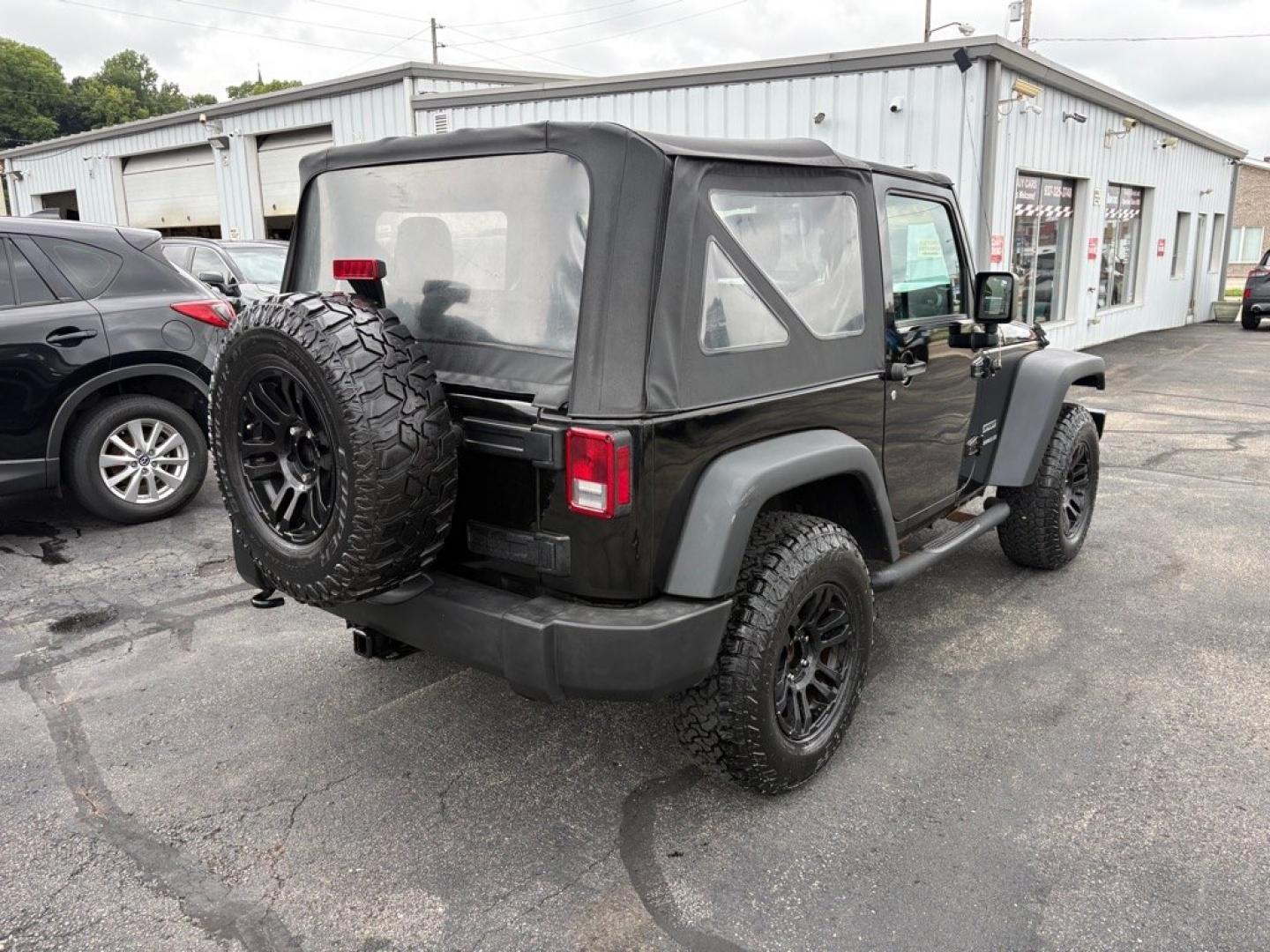 2017 BLACK JEEP WRANGLER SPORT (1C4AJWAG9HL) with an 3.6L engine, Manual transmission, located at 501 E. Columbia St., Springfield, OH, 45503, (800) 262-7122, 39.925262, -83.801796 - *** New A/T Tires *** Clean CarFax *** Oil Change *** New Axle Seals *** Upgrade Oil Filter Housing *** Inspection *** Manual Trans w/ 4wd *** V6 *** Sharp!! *** New Front Diff cover and Seal *** Jay North Auto has offered hand picked vehicles since 1965! Our customer's enjoy a NO pressure buyin- Photo#2