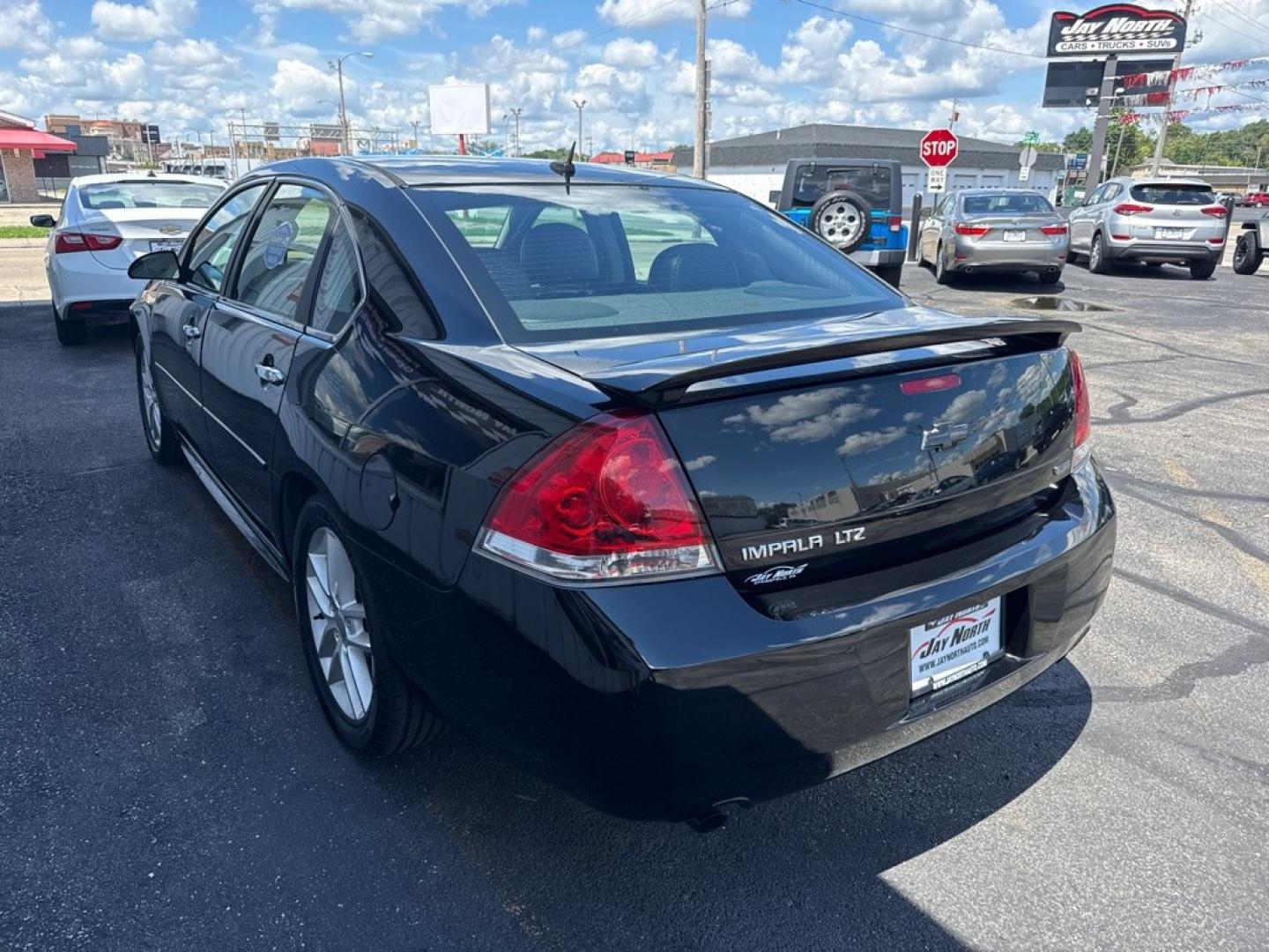2014 BLACK CHEVROLET IMPALA LIMITED LTZ (2G1WC5E36E1) with an 3.6L engine, Automatic transmission, located at 501 E. Columbia St., Springfield, OH, 45503, (800) 262-7122, 39.925262, -83.801796 - *** Clean CarFax w/ 35 Service Records *** LTZ *** Moonroof *** Leather *** Bose Audio *** New Cabin and Air filter *** New Wipers *** New Tires *** New Brakes *** Remote Start *** Jay North Auto has offered hand picked vehicles since 1965! Our customer's enjoy a NO pressure buying experience w- Photo#3