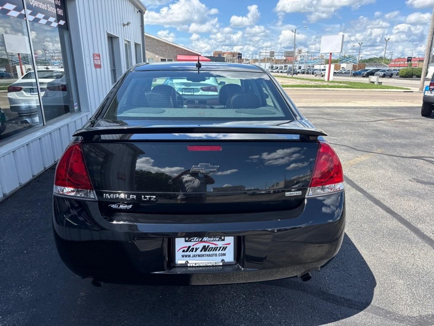 2014 BLACK CHEVROLET IMPALA LIMITED LTZ (2G1WC5E36E1) with an 3.6L engine, Automatic transmission, located at 501 E. Columbia St., Springfield, OH, 45503, (800) 262-7122, 39.925262, -83.801796 - *** Clean CarFax w/ 35 Service Records *** LTZ *** Moonroof *** Leather *** Bose Audio *** New Cabin and Air filter *** New Wipers *** New Tires *** New Brakes *** Remote Start *** Jay North Auto has offered hand picked vehicles since 1965! Our customer's enjoy a NO pressure buying experience w- Photo#4