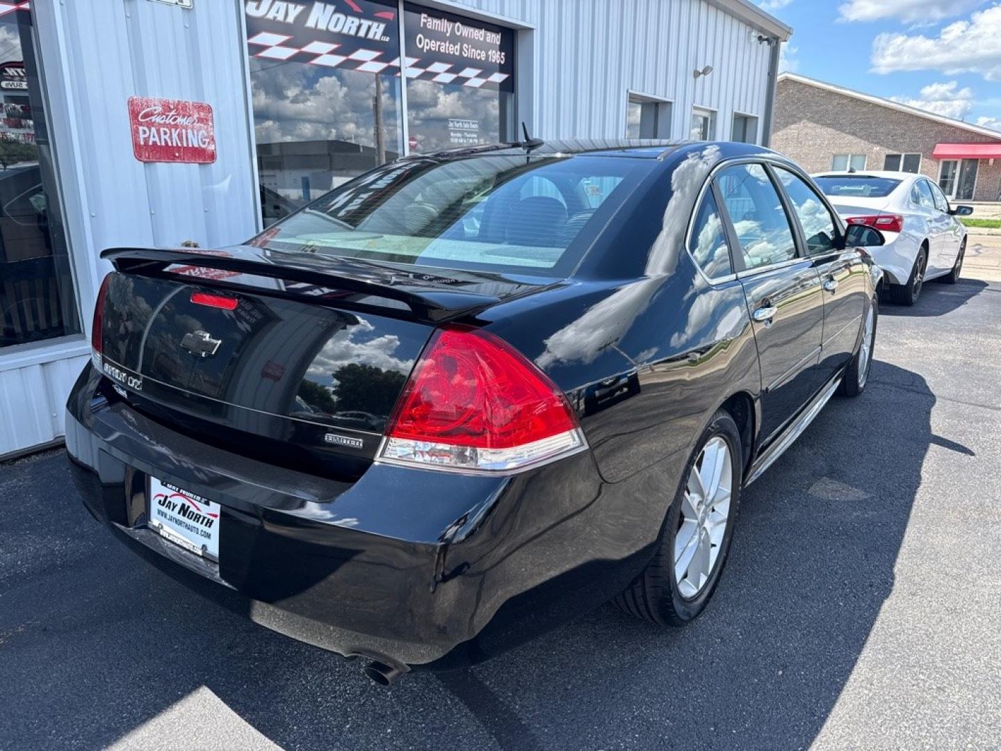 2014 BLACK CHEVROLET IMPALA LIMITED LTZ (2G1WC5E36E1) with an 3.6L engine, Automatic transmission, located at 501 E. Columbia St., Springfield, OH, 45503, (800) 262-7122, 39.925262, -83.801796 - *** Clean CarFax w/ 35 Service Records *** LTZ *** Moonroof *** Leather *** Bose Audio *** New Cabin and Air filter *** New Wipers *** New Tires *** New Brakes *** Remote Start *** Jay North Auto has offered hand picked vehicles since 1965! Our customer's enjoy a NO pressure buying experience w- Photo#5