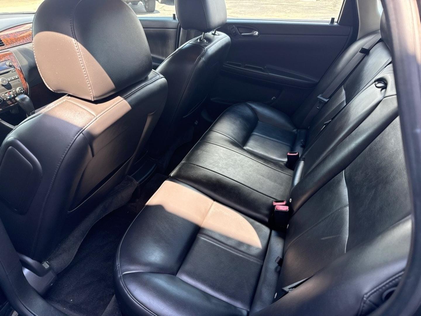 2014 BLACK CHEVROLET IMPALA LIMITED LTZ (2G1WC5E36E1) with an 3.6L engine, Automatic transmission, located at 501 E. Columbia St., Springfield, OH, 45503, (800) 262-7122, 39.925262, -83.801796 - *** Clean CarFax w/ 35 Service Records *** LTZ *** Moonroof *** Leather *** Bose Audio *** New Cabin and Air filter *** New Wipers *** New Tires *** New Brakes *** Remote Start *** Jay North Auto has offered hand picked vehicles since 1965! Our customer's enjoy a NO pressure buying experience w- Photo#7