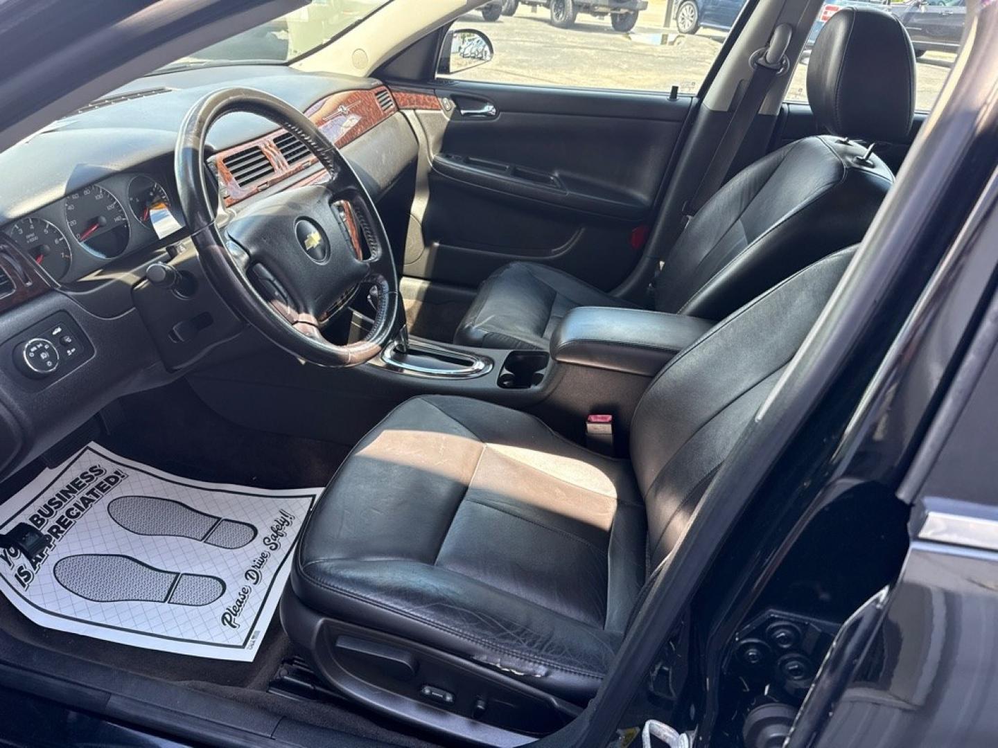 2014 BLACK CHEVROLET IMPALA LIMITED LTZ (2G1WC5E36E1) with an 3.6L engine, Automatic transmission, located at 501 E. Columbia St., Springfield, OH, 45503, (800) 262-7122, 39.925262, -83.801796 - *** Clean CarFax w/ 35 Service Records *** LTZ *** Moonroof *** Leather *** Bose Audio *** New Cabin and Air filter *** New Wipers *** New Tires *** New Brakes *** Remote Start *** Jay North Auto has offered hand picked vehicles since 1965! Our customer's enjoy a NO pressure buying experience w- Photo#9