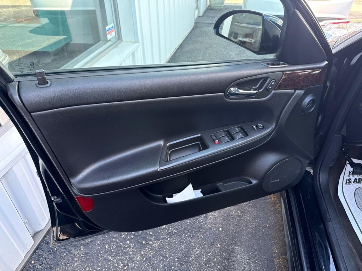 2014 BLACK CHEVROLET IMPALA LIMITED LTZ (2G1WC5E36E1) with an 3.6L engine, Automatic transmission, located at 501 E. Columbia St., Springfield, OH, 45503, (800) 262-7122, 39.925262, -83.801796 - *** Clean CarFax w/ 35 Service Records *** LTZ *** Moonroof *** Leather *** Bose Audio *** New Cabin and Air filter *** New Wipers *** New Tires *** New Brakes *** Remote Start *** Jay North Auto has offered hand picked vehicles since 1965! Our customer's enjoy a NO pressure buying experience w- Photo#10