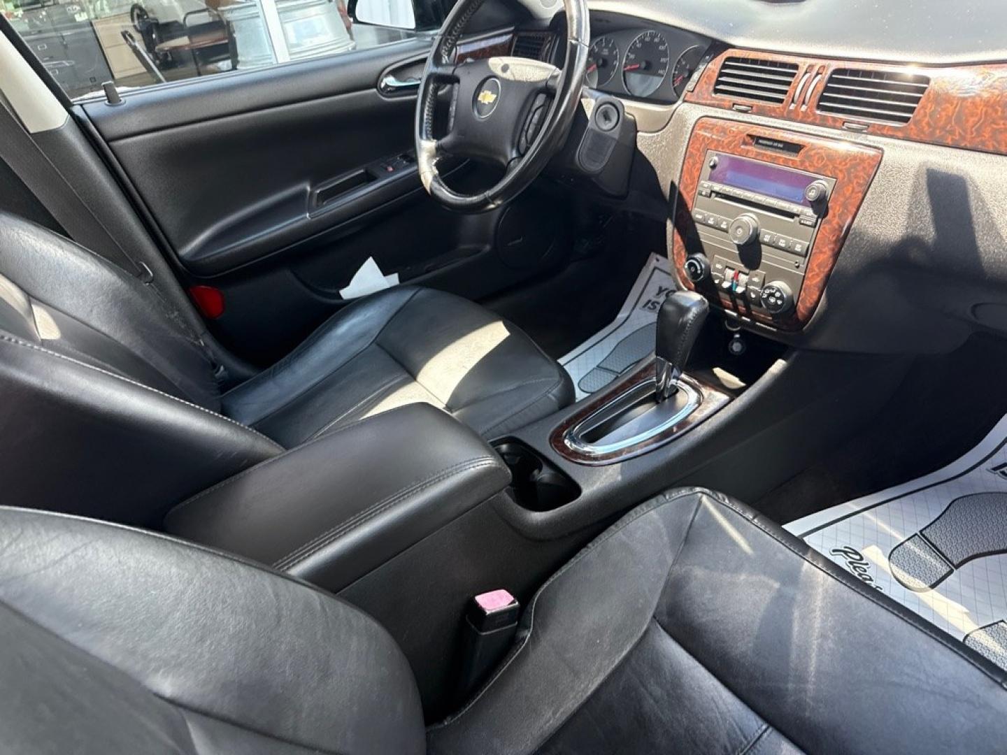 2014 BLACK CHEVROLET IMPALA LIMITED LTZ (2G1WC5E36E1) with an 3.6L engine, Automatic transmission, located at 501 E. Columbia St., Springfield, OH, 45503, (800) 262-7122, 39.925262, -83.801796 - *** Clean CarFax w/ 35 Service Records *** LTZ *** Moonroof *** Leather *** Bose Audio *** New Cabin and Air filter *** New Wipers *** New Tires *** New Brakes *** Remote Start *** Jay North Auto has offered hand picked vehicles since 1965! Our customer's enjoy a NO pressure buying experience w- Photo#14