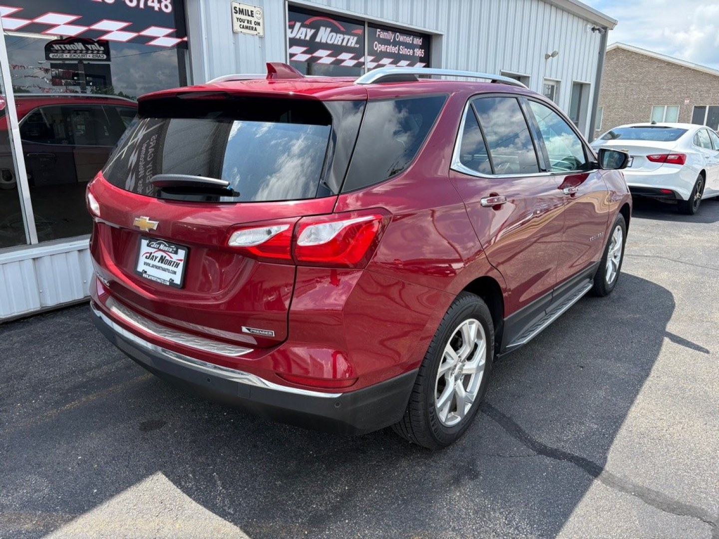 2018 RED CHEVROLET EQUINOX PREMIER (3GNAXMEV2JL) with an 1.5L engine, Automatic transmission, located at 501 E. Columbia St., Springfield, OH, 45503, (800) 262-7122, 39.925262, -83.801796 - ***1-Owner***PREMIER***LOADED***Heated and Cooled Leather Seating***Wireless Charging***Premium Sound System***Power Lift Gate***Heated Steering Wheel***Remote Start***Memory Seats*** Jay North Auto has offered hand picked vehicles since 1965! Our customer's enjoy a NO pressure buying experience- Photo#2