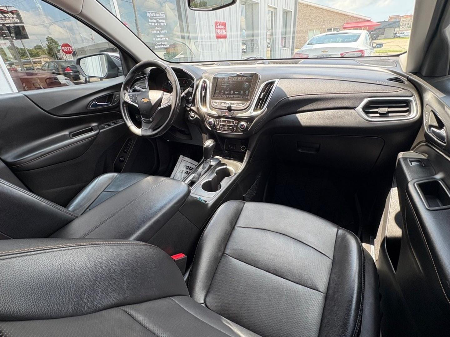 2018 RED CHEVROLET EQUINOX PREMIER (3GNAXMEV2JL) with an 1.5L engine, Automatic transmission, located at 501 E. Columbia St., Springfield, OH, 45503, (800) 262-7122, 39.925262, -83.801796 - ***1-Owner***PREMIER***LOADED***Heated and Cooled Leather Seating***Wireless Charging***Premium Sound System***Power Lift Gate***Heated Steering Wheel***Remote Start***Memory Seats*** Jay North Auto has offered hand picked vehicles since 1965! Our customer's enjoy a NO pressure buying experience- Photo#17