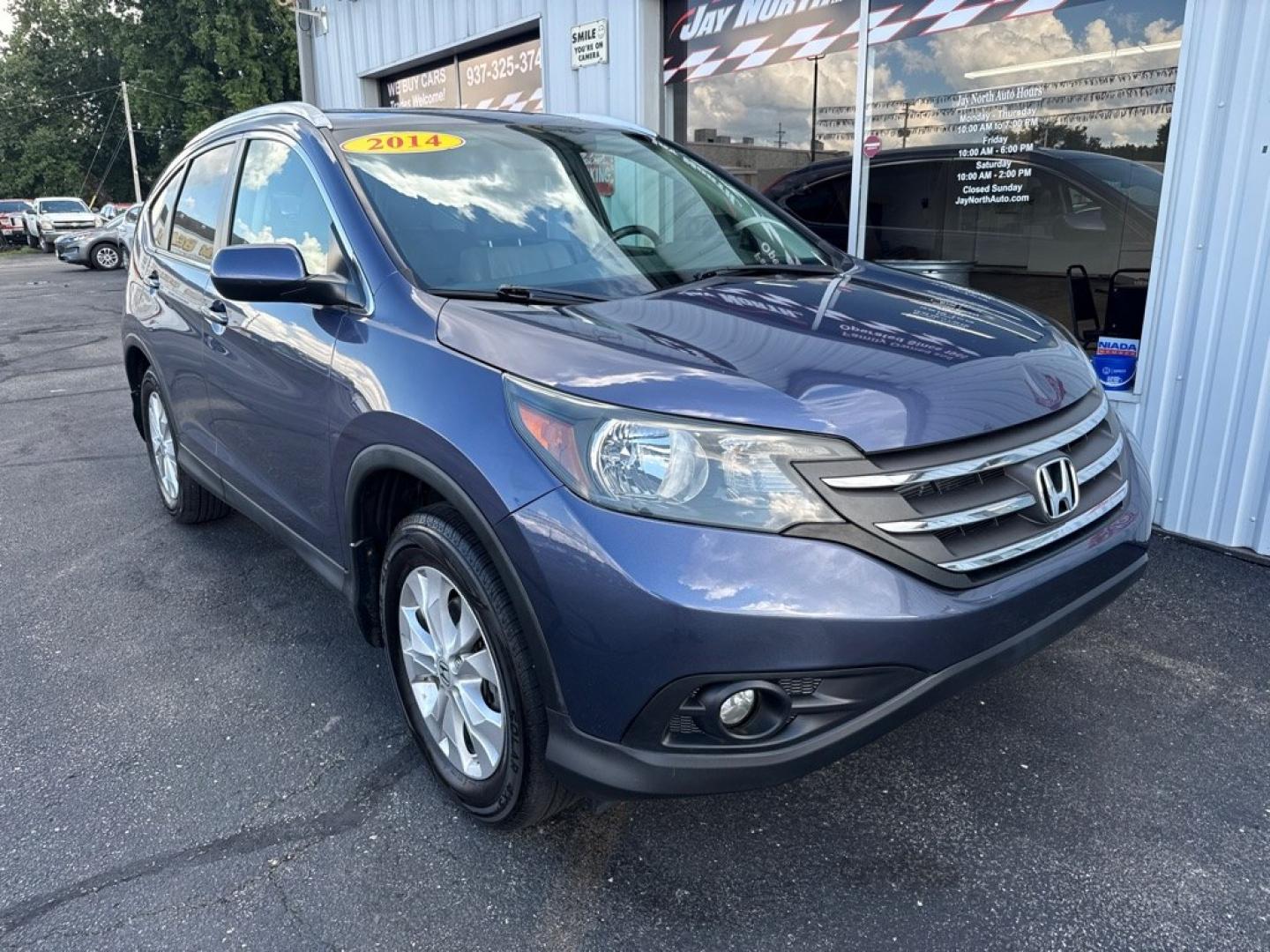 2014 BLUE HONDA CR-V EXL (2HKRM4H7XEH) with an 2.4L engine, Automatic transmission, located at 501 E. Columbia St., Springfield, OH, 45503, (800) 262-7122, 39.925262, -83.801796 - *** EX-L *** AWD *** Leather *** Moonroof *** New Brakes *** New Wipers *** Oil Change *** Inspection *** New Cabin and Air Filter *** Jay North Auto has offered hand picked vehicles since 1965! Our customer's enjoy a NO pressure buying experience with a small town feel. All of our vehicles get- Photo#0