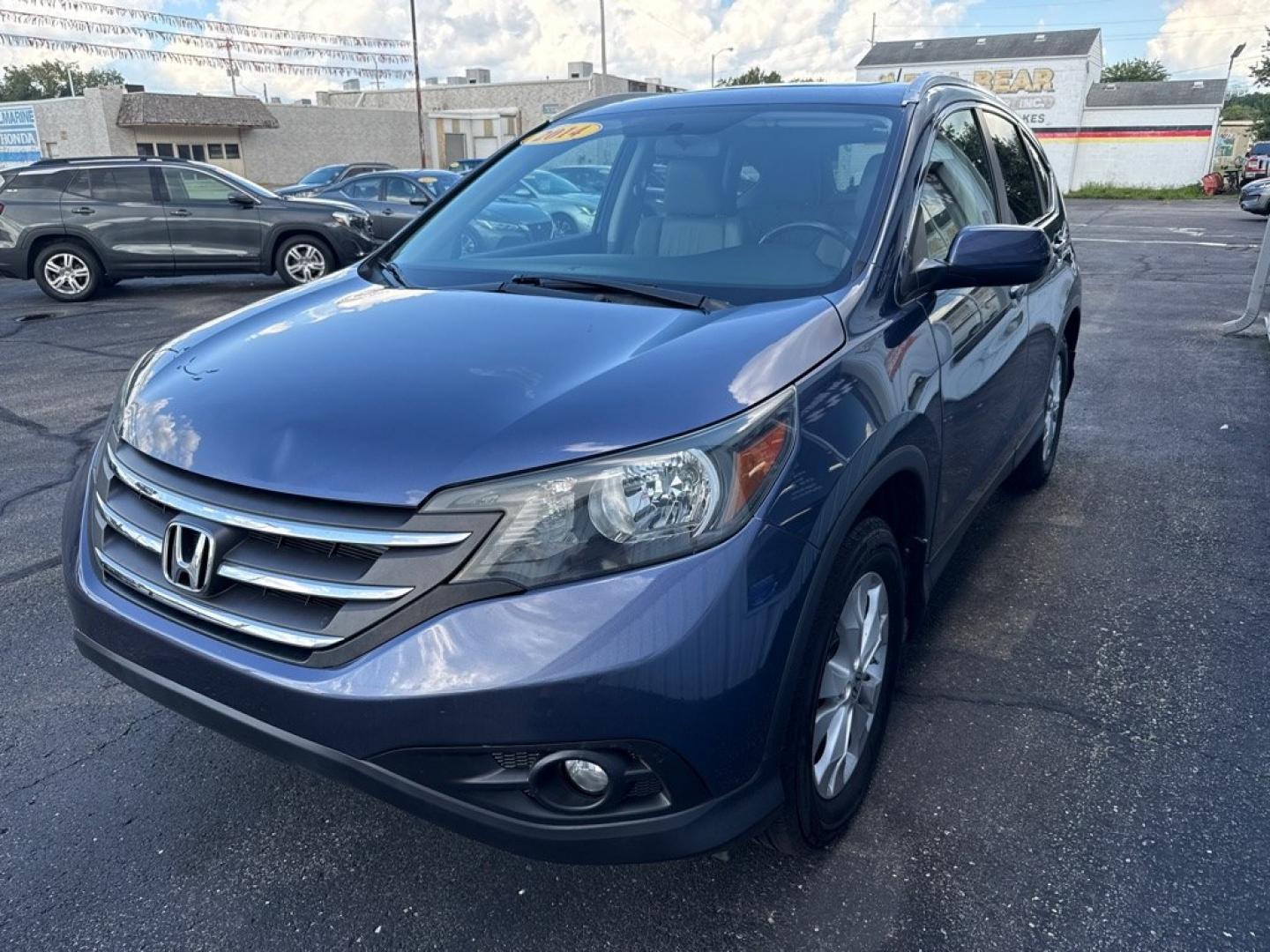 2014 BLUE HONDA CR-V EXL (2HKRM4H7XEH) with an 2.4L engine, Automatic transmission, located at 501 E. Columbia St., Springfield, OH, 45503, (800) 262-7122, 39.925262, -83.801796 - *** EX-L *** AWD *** Leather *** Moonroof *** New Brakes *** New Wipers *** Oil Change *** Inspection *** New Cabin and Air Filter *** Jay North Auto has offered hand picked vehicles since 1965! Our customer's enjoy a NO pressure buying experience with a small town feel. All of our vehicles get- Photo#2