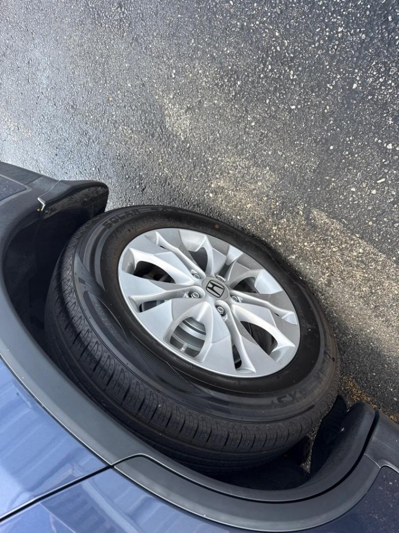 2014 BLUE HONDA CR-V EXL (2HKRM4H7XEH) with an 2.4L engine, Automatic transmission, located at 501 E. Columbia St., Springfield, OH, 45503, (800) 262-7122, 39.925262, -83.801796 - *** EX-L *** AWD *** Leather *** Moonroof *** New Brakes *** New Wipers *** Oil Change *** Inspection *** New Cabin and Air Filter *** Jay North Auto has offered hand picked vehicles since 1965! Our customer's enjoy a NO pressure buying experience with a small town feel. All of our vehicles get- Photo#3
