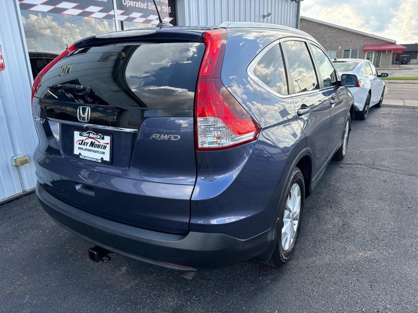 2014 BLUE HONDA CR-V EXL (2HKRM4H7XEH) with an 2.4L engine, Automatic transmission, located at 501 E. Columbia St., Springfield, OH, 45503, (800) 262-7122, 39.925262, -83.801796 - *** EX-L *** AWD *** Leather *** Moonroof *** New Brakes *** New Wipers *** Oil Change *** Inspection *** New Cabin and Air Filter *** Jay North Auto has offered hand picked vehicles since 1965! Our customer's enjoy a NO pressure buying experience with a small town feel. All of our vehicles get- Photo#6