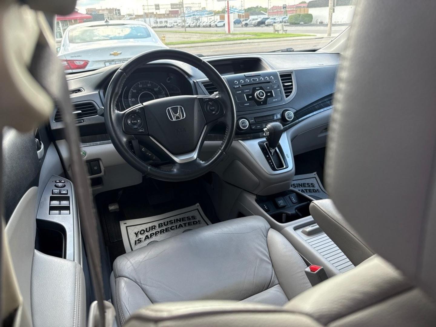 2014 BLUE HONDA CR-V EXL (2HKRM4H7XEH) with an 2.4L engine, Automatic transmission, located at 501 E. Columbia St., Springfield, OH, 45503, (800) 262-7122, 39.925262, -83.801796 - *** EX-L *** AWD *** Leather *** Moonroof *** New Brakes *** New Wipers *** Oil Change *** Inspection *** New Cabin and Air Filter *** Jay North Auto has offered hand picked vehicles since 1965! Our customer's enjoy a NO pressure buying experience with a small town feel. All of our vehicles get- Photo#10