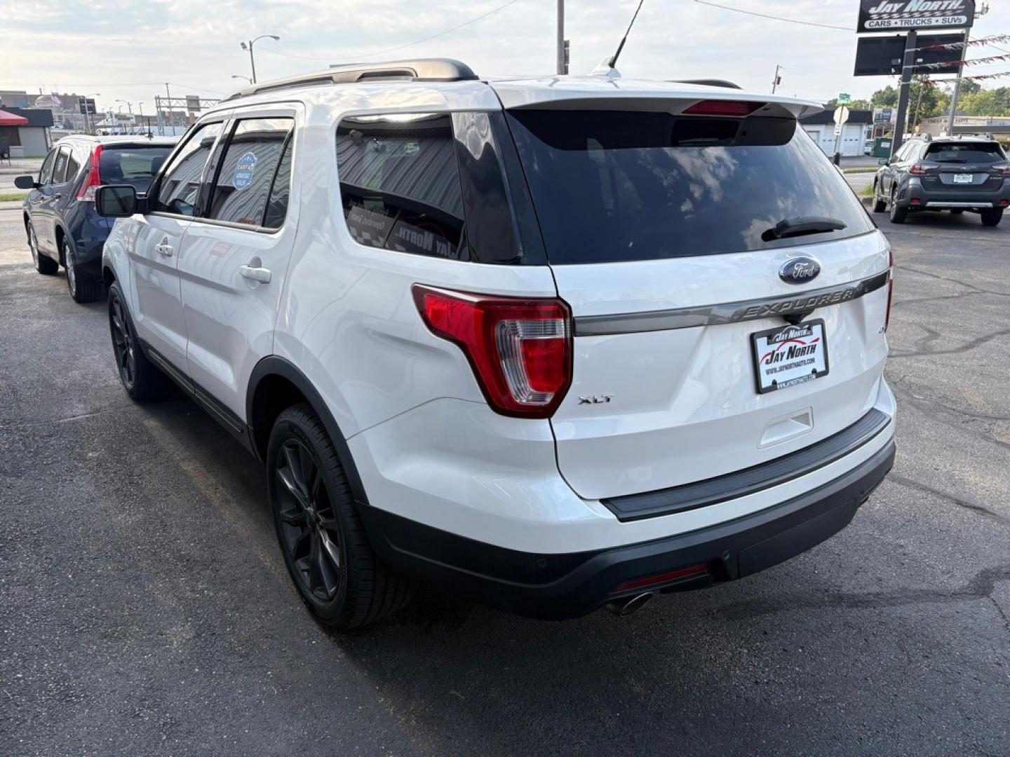 2019 WHITE FORD EXPLORER XLT (1FM5K8D83KG) with an 3.5L engine, Automatic transmission, located at 501 E. Columbia St., Springfield, OH, 45503, (800) 262-7122, 39.925262, -83.801796 - ***Clean Carfax***XLT Sport Appearance Package***Heated Leather and Suede Seating***Navigation***Blind Spot***Power Lift Gate***2nd Row Bucket Seats***Heated Steering Wheel***New Tires***All New Brakes***Fresh Oil Change*** Jay North Auto has offered hand picked vehicles since 1965! Our custome- Photo#4