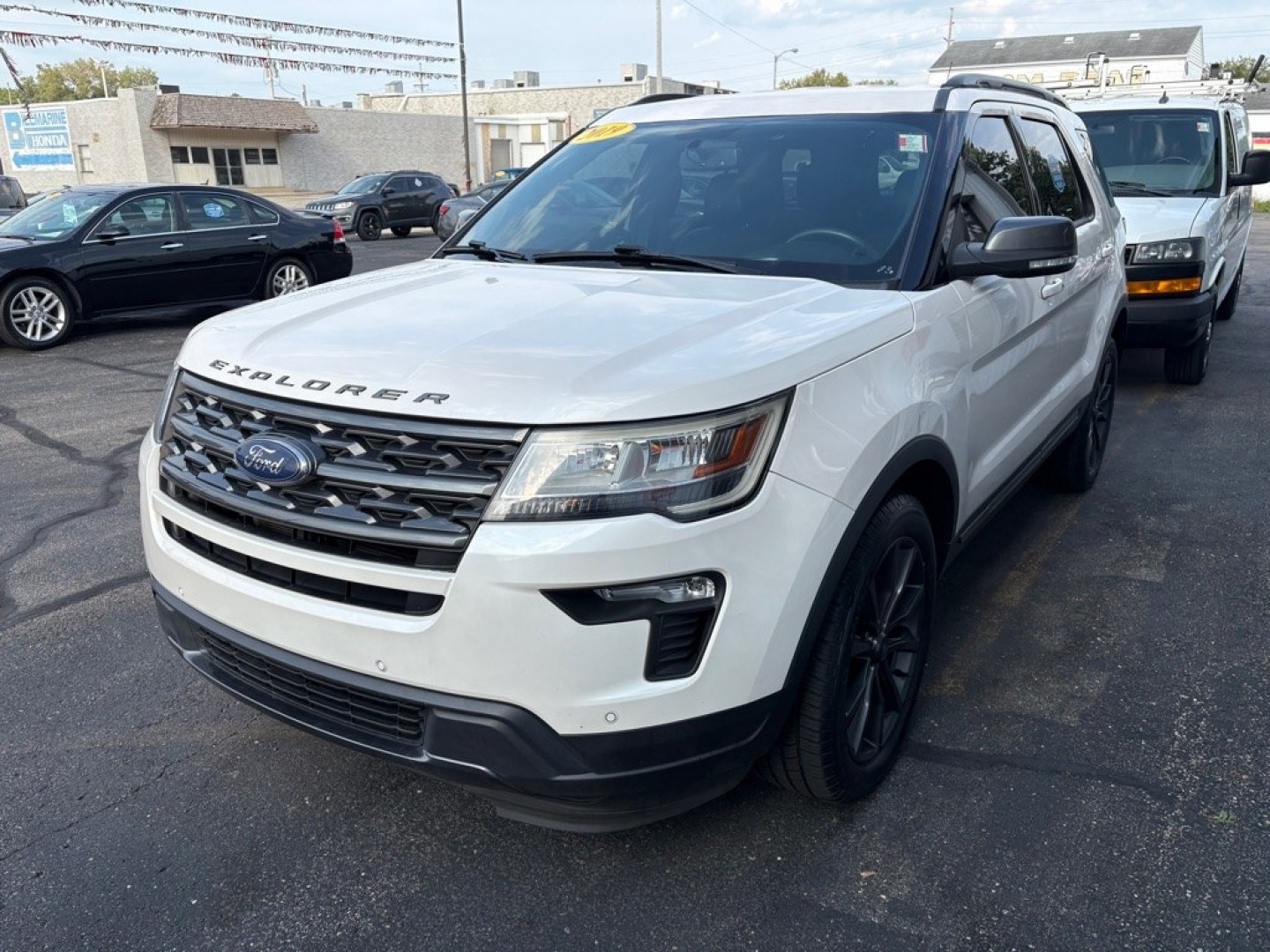 2019 WHITE FORD EXPLORER XLT (1FM5K8D83KG) with an 3.5L engine, Automatic transmission, located at 501 E. Columbia St., Springfield, OH, 45503, (800) 262-7122, 39.925262, -83.801796 - ***Clean Carfax***XLT Sport Appearance Package***Heated Leather and Suede Seating***Navigation***Blind Spot***Power Lift Gate***2nd Row Bucket Seats***Heated Steering Wheel***New Tires***All New Brakes***Fresh Oil Change*** Jay North Auto has offered hand picked vehicles since 1965! Our custome- Photo#5