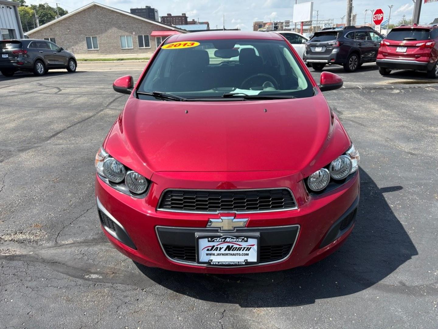 2013 RED CHEVROLET SONIC LT (1G1JC6SB8D4) with an 1.4L engine, Automatic transmission, located at 501 E. Columbia St., Springfield, OH, 45503, (800) 262-7122, 39.925262, -83.801796- Photo#6