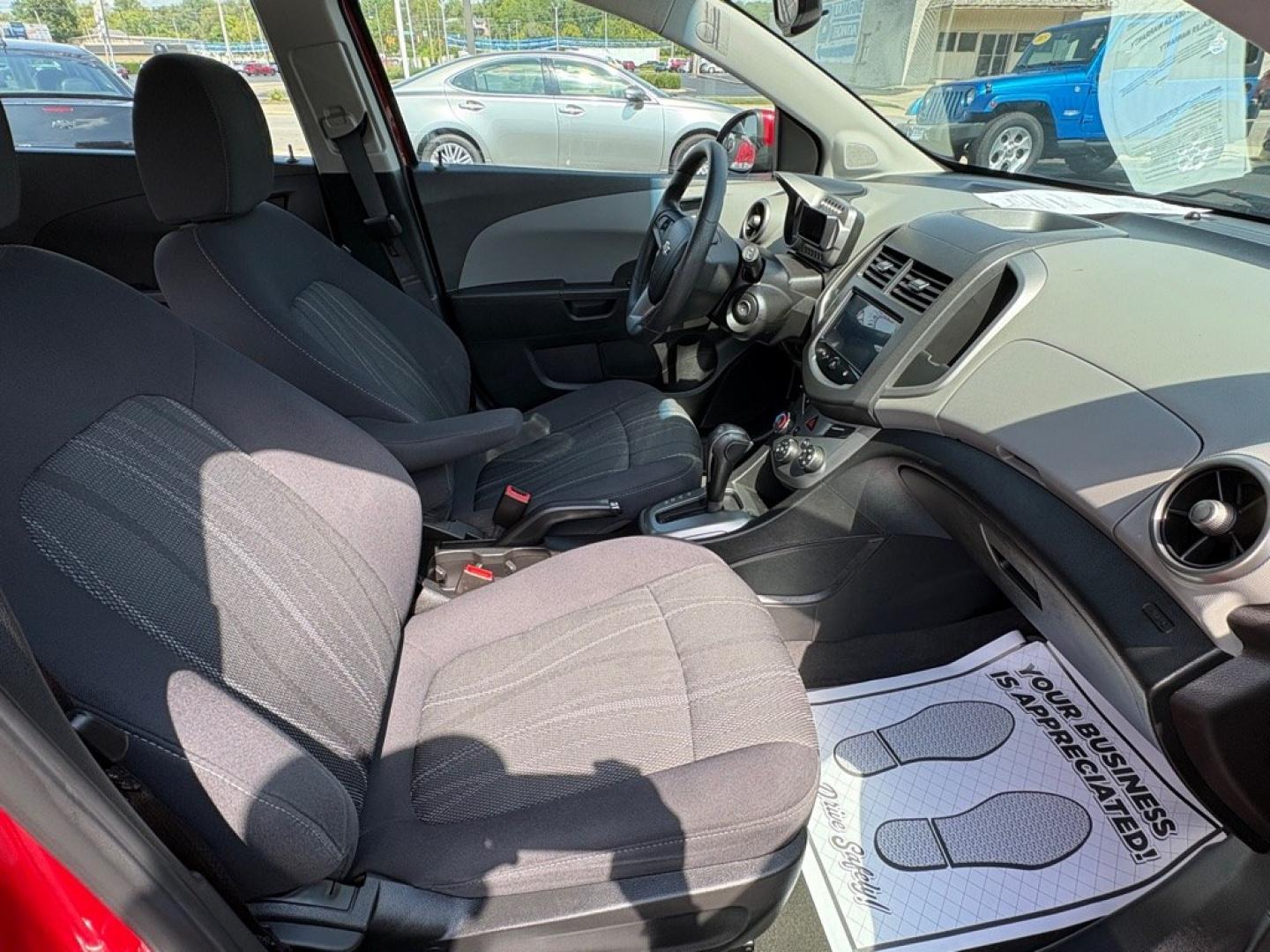 2013 RED CHEVROLET SONIC LT (1G1JC6SB8D4) with an 1.4L engine, Automatic transmission, located at 501 E. Columbia St., Springfield, OH, 45503, (800) 262-7122, 39.925262, -83.801796- Photo#16