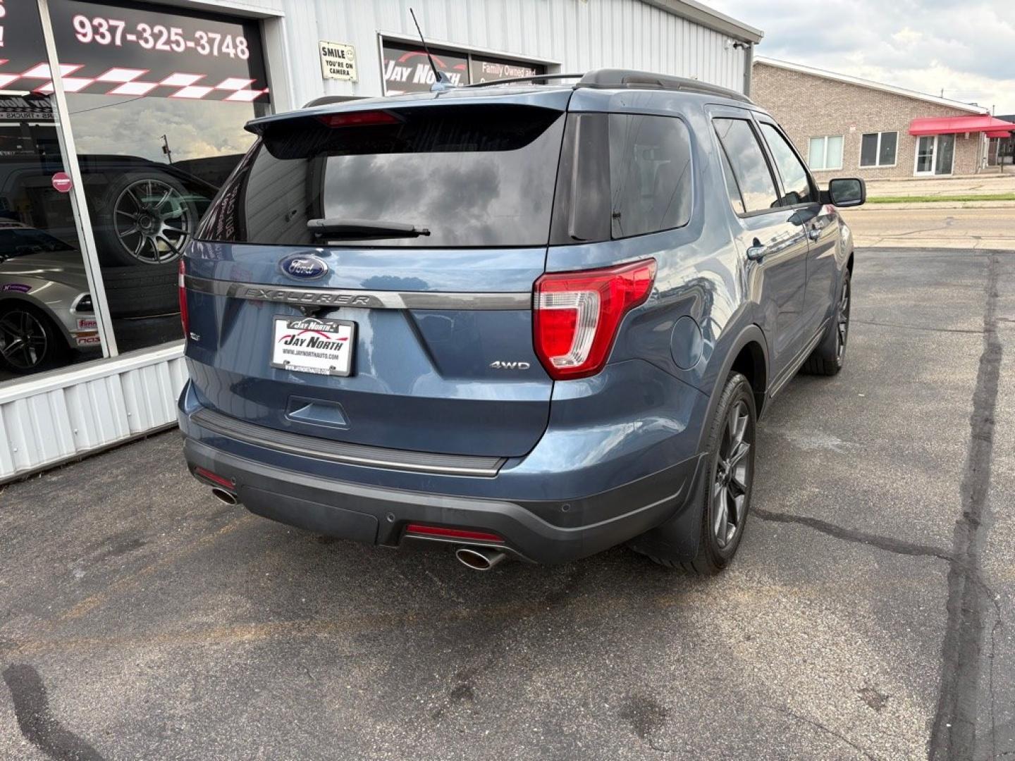 2018 BLUE FORD EXPLORER XLT (1FM5K8D83JG) with an 3.5L engine, Automatic transmission, located at 501 E. Columbia St., Springfield, OH, 45503, (800) 262-7122, 39.925262, -83.801796 - ***1-Owner***Clean Carfax***4WD***XLT***Sport Appearance Package***Ford Safe and Smart Package***Heated Leather/Suede Seating***Heated Steering Wheel***Remote Start***Navigation***Power Lift Gate***All New Brake Pads and Rotors***New Air Filter and Cabin Air Filter***Fresh Oil Change*** Jay Nor- Photo#2