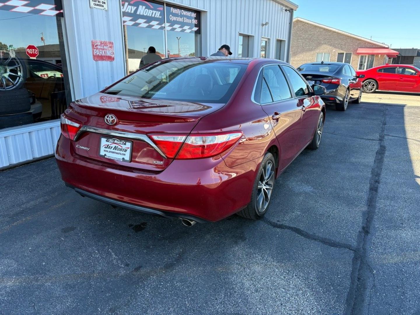 2016 RED TOYOTA CAMRY XSE (4T1BF1FK7GU) with an 2.5L engine, Automatic transmission, located at 501 E. Columbia St., Springfield, OH, 45503, (800) 262-7122, 39.925262, -83.801796 - **2016 Toyota Camry XSE - Only 92K Miles, 26 Service Records and New Tires!** Check out this SHARP 2016 Toyota Camry XSE! Powered by a fuel-efficient 2.5L 4-cylinder engine, this sporty sedan offers the perfect combination of comfort, reliability, and style! With only 92K miles, 2 previous owne- Photo#1